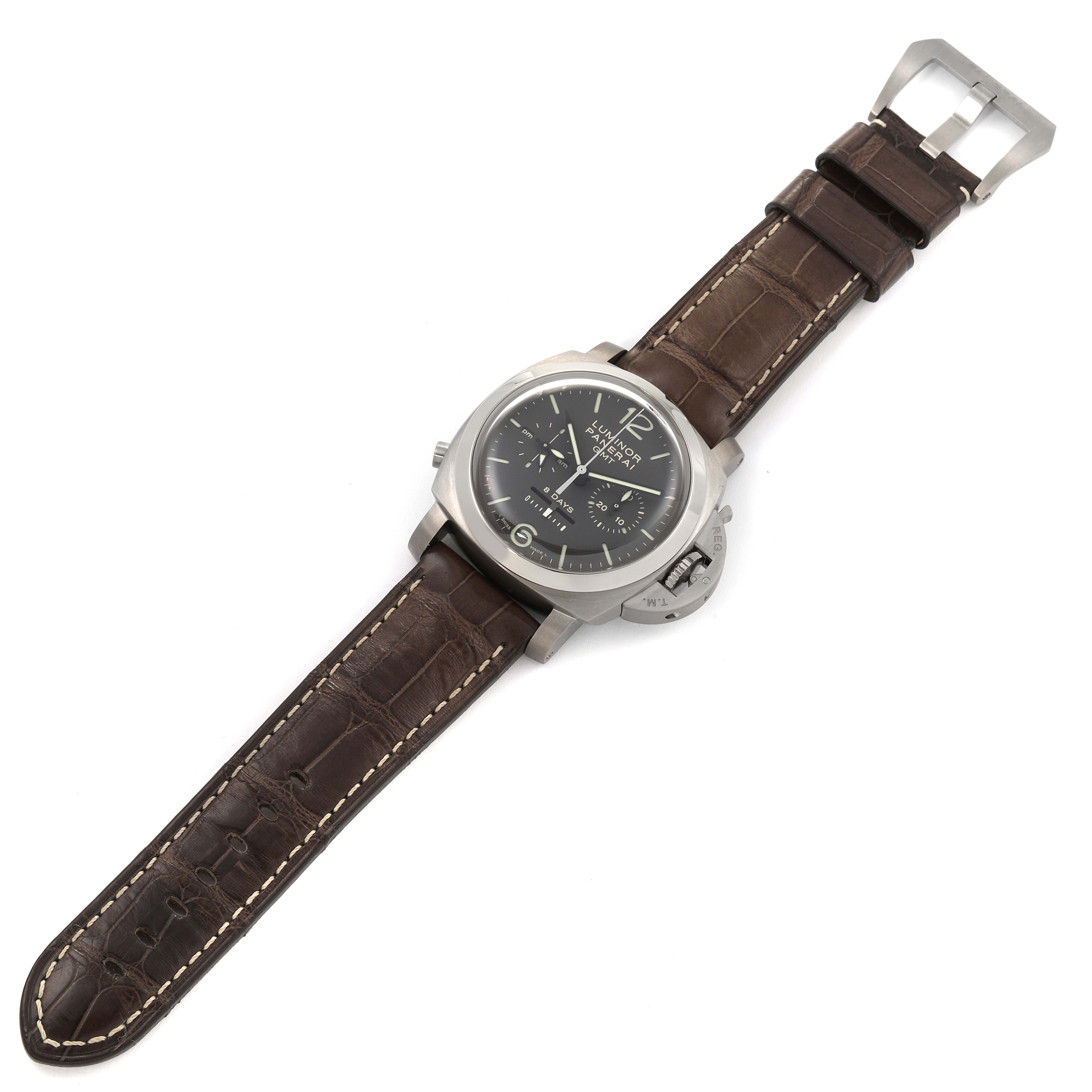 The image shows a Panerai Luminor PAM00311 Men
s Titanium Brown Dial PAM00311 Men
s Titanium Brown Dial watch with a leather strap, displayed from a top-down angle.