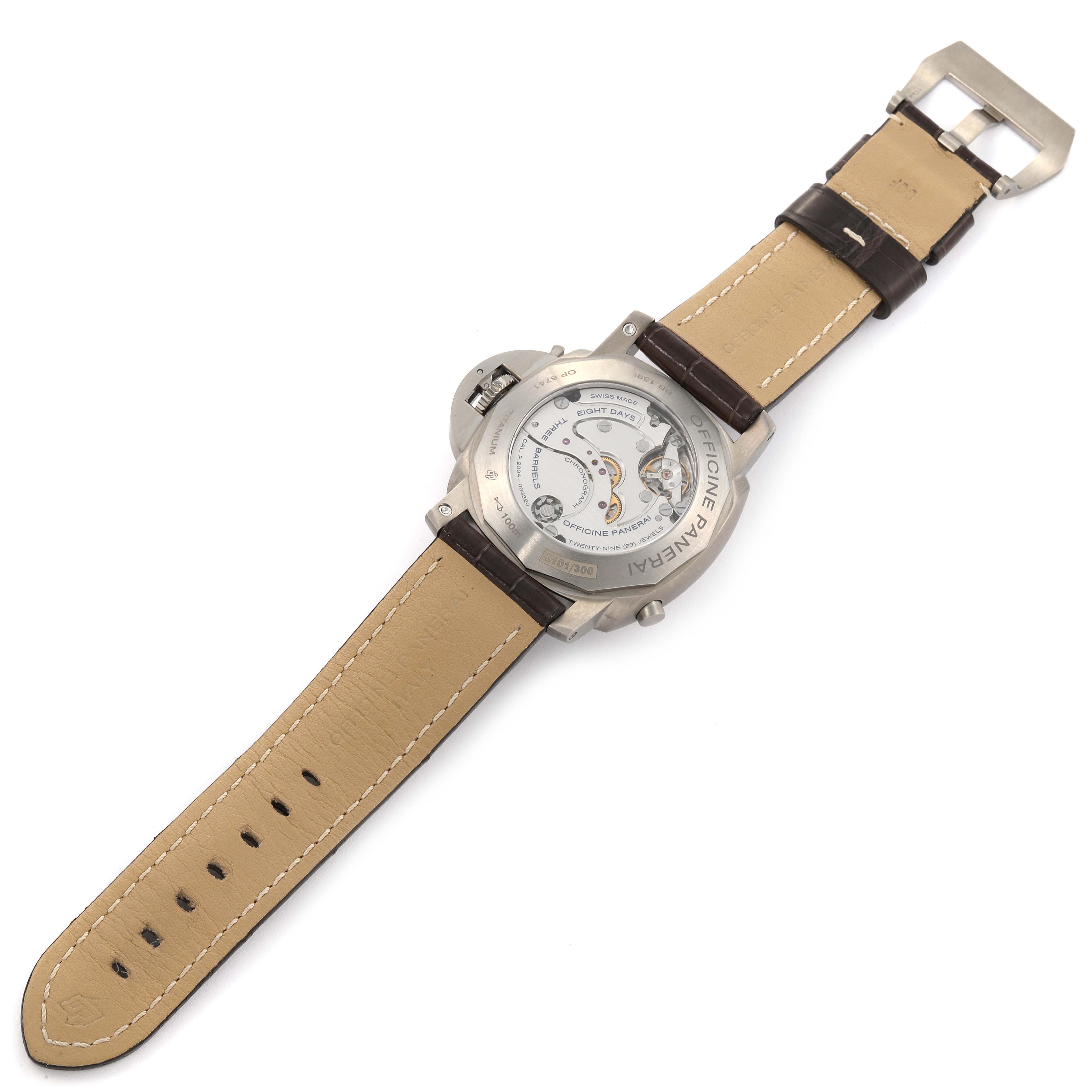 This image shows the back view of the Panerai Luminor PAM00311 Men
s Titanium Brown Dial PAM00311 Men
s Titanium Brown Dial watch, displaying its mechanism and leather strap.