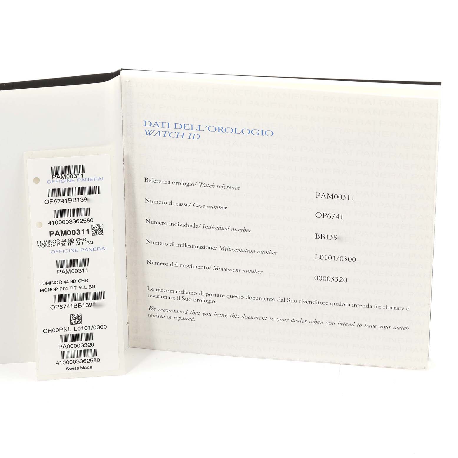 This image shows the paperwork and identification tags for a Panerai Luminor PAM00311 Men
s Titanium Brown Dial PAM00311 Men
s Titanium Brown Dial model watch, detailing its reference numbers and specifications.