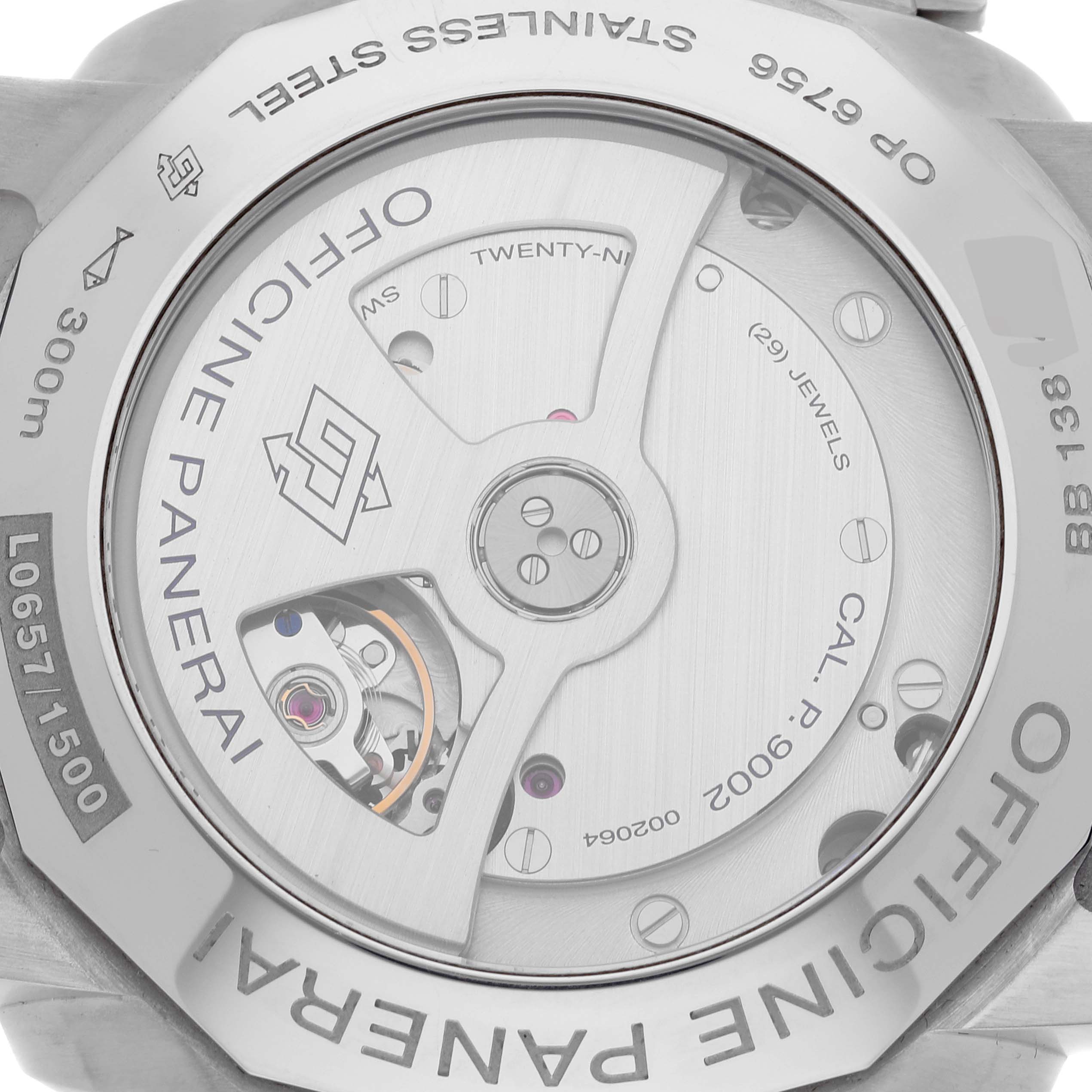 The image shows the back of a Panerai Luminor PAM00321 Men
s Stainless Steel Black Dial PAM00321 Men
s Stainless Steel Black Dial watch, revealing its movement and inscriptions.