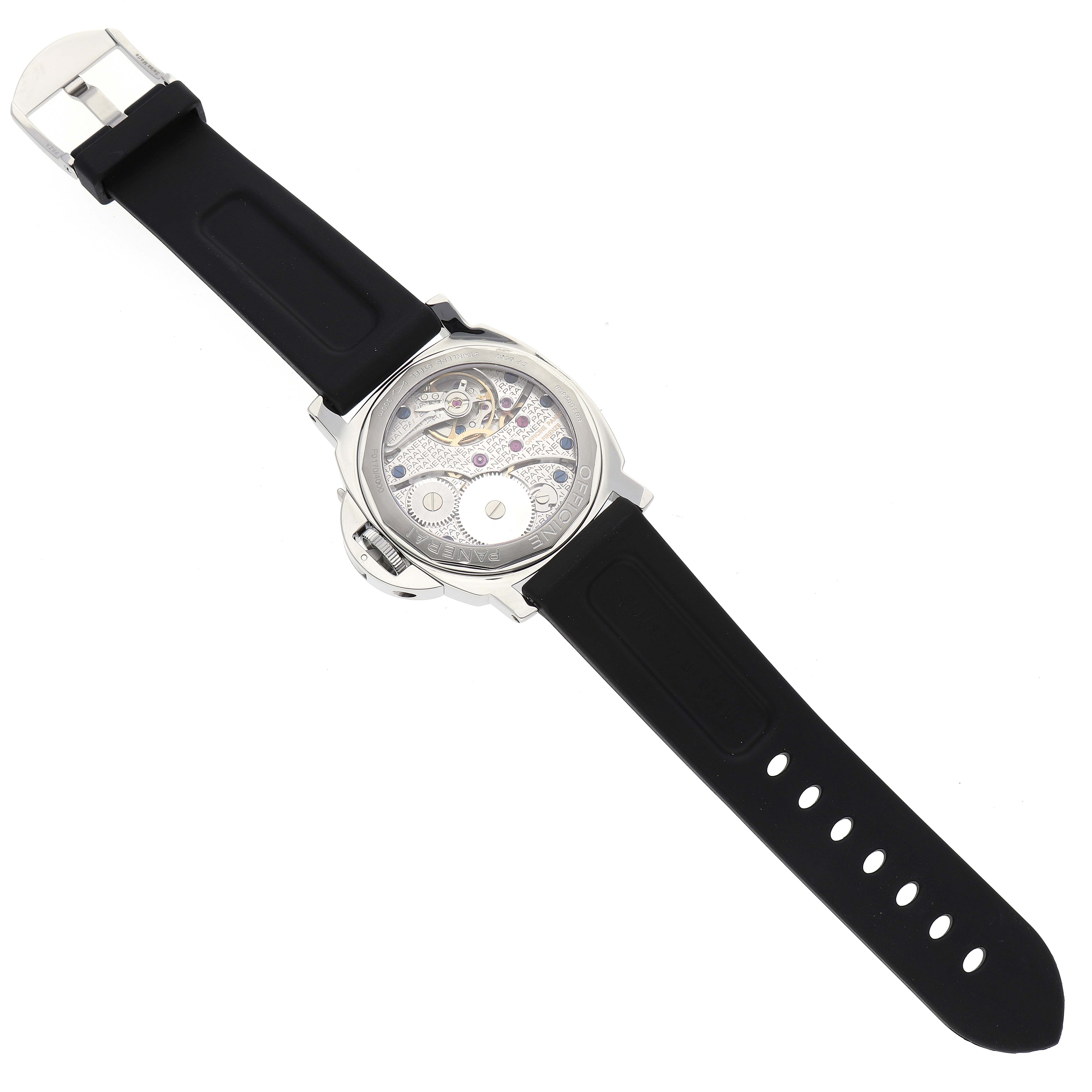 The image shows the back view of a Panerai Luminor PAM00113 Men's Stainless Steel White Dial PAM00113 Men's Stainless Steel White Dial watch, featuring its transparent case back and mechanical movement.