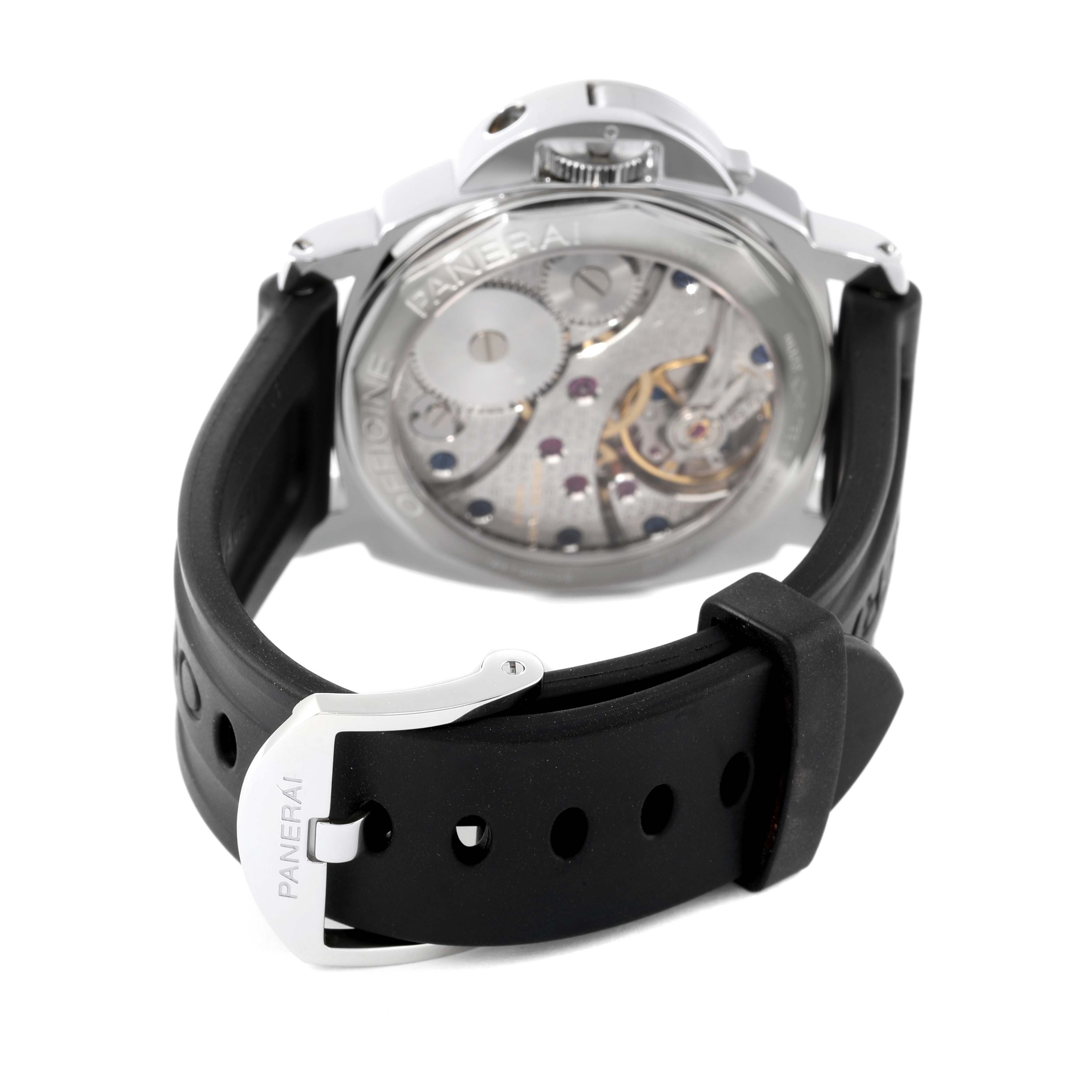 The image shows the back view of a Panerai Luminor PAM00113 Men's Stainless Steel White Dial PAM00113 Men's Stainless Steel White Dial watch, displaying its transparent case back and black rubber strap with a buckle.