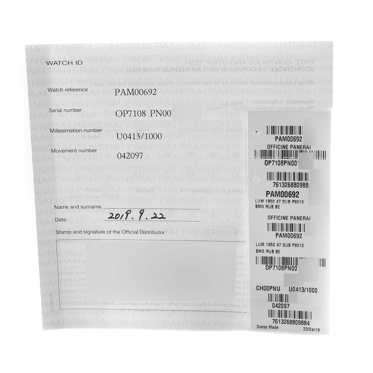 This image shows the warranty certificate and tag for the Panerai Submersible PAM00692 Men's Titanium Blue Dial PAM00692 Men's Titanium Blue Dial model PAM00692 watch, including serial and reference numbers.