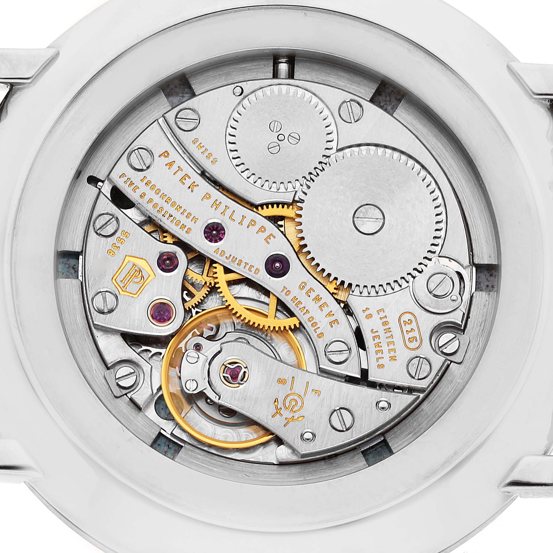 This is a close-up view of the movement of a Patek Philippe Calatrava 5116G Men
s White Gold White Dial 5116G Men
s White Gold White Dial watch, showing its intricate gears and inner mechanisms.
