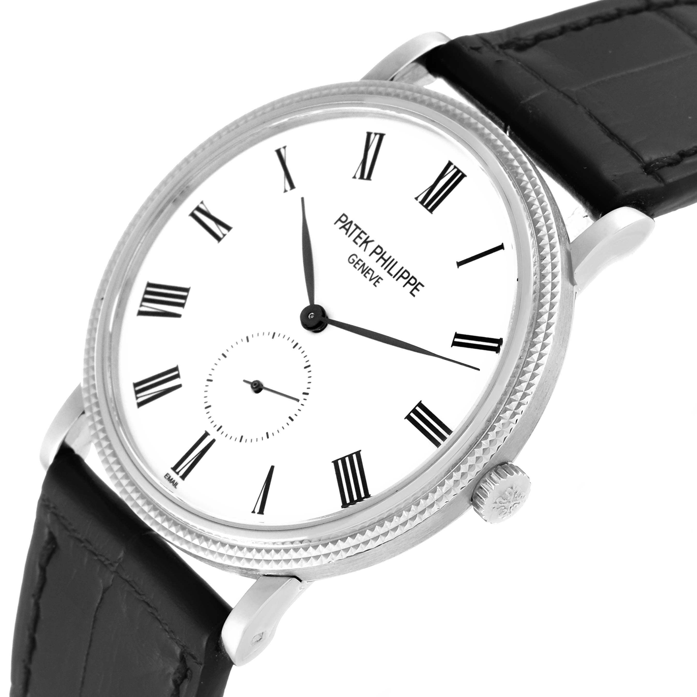 The image shows a Patek Philippe Calatrava 5116G Men
s White Gold White Dial 5116G Men
s White Gold White Dial watch from a front angle, highlighting the dial, crown, and part of the leather strap.
