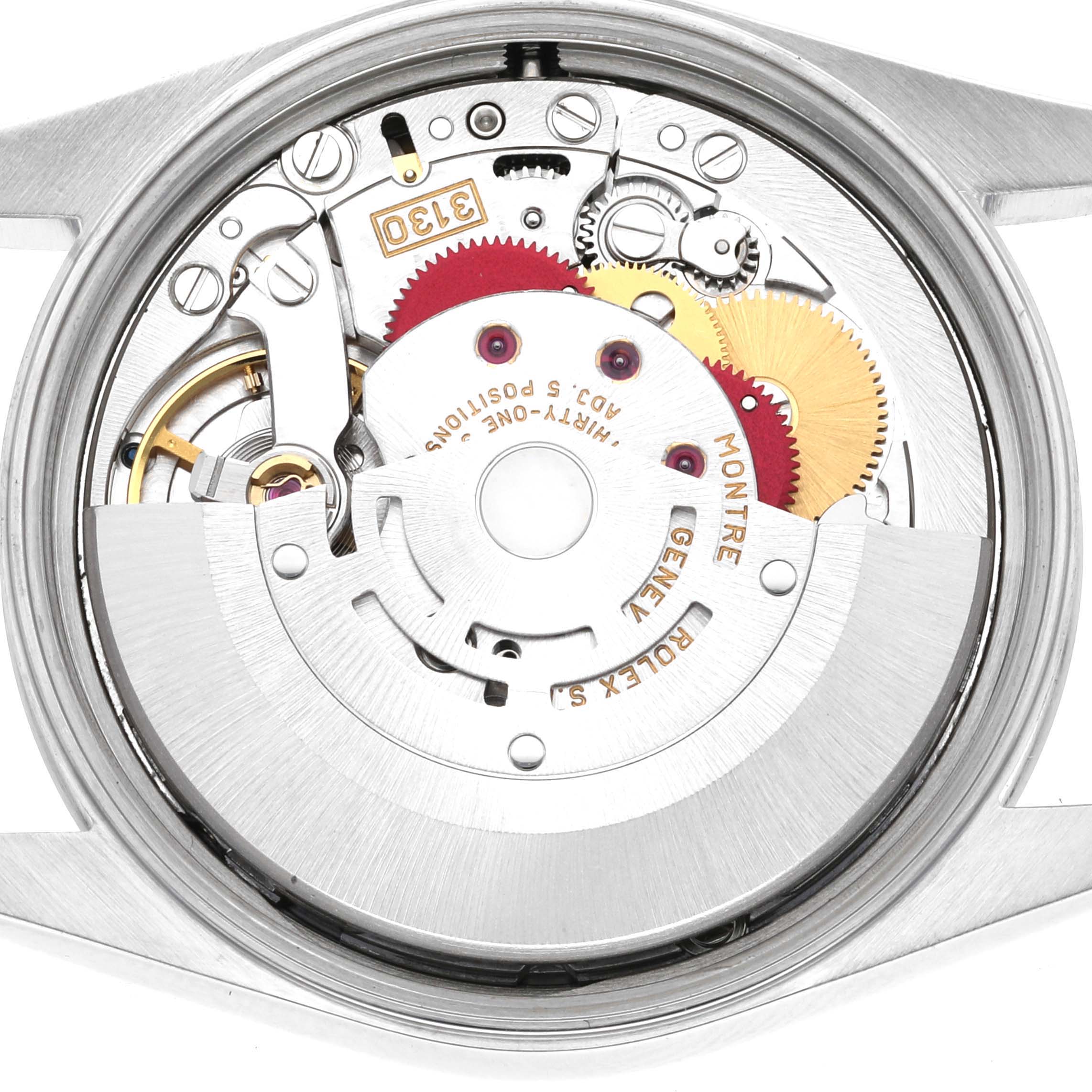 This is a close-up view of the intricate mechanical movement inside a Rolex Air-King 14000M Men's Stainless Steel Blue Dial 14000M Men's Stainless Steel Blue Dial watch.