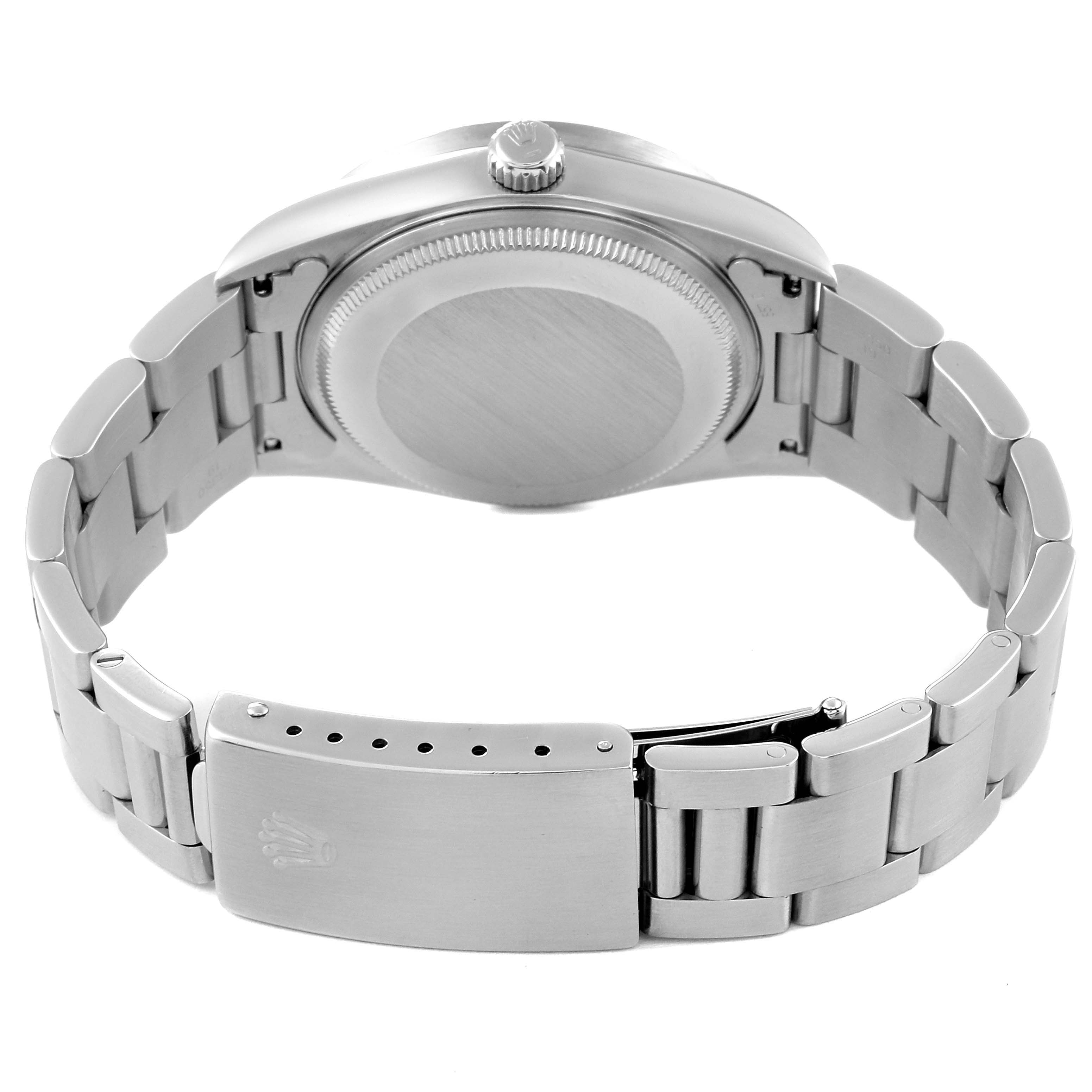 The image shows the back view of a Rolex Air-King 14010 Men's Stainless Steel Black Dial 14010 Men's Stainless Steel Black Dial watch, highlighting its stainless steel case, bracelet, and clasp.