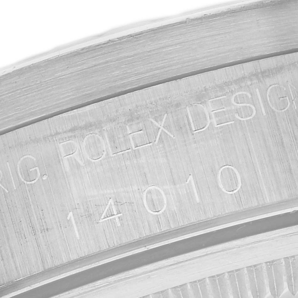 The image shows a close-up of the inner bezel of a Rolex Air-King 14010 Men's Stainless Steel Black Dial 14010 Men's Stainless Steel Black Dial watch with the engraved model number 14010.