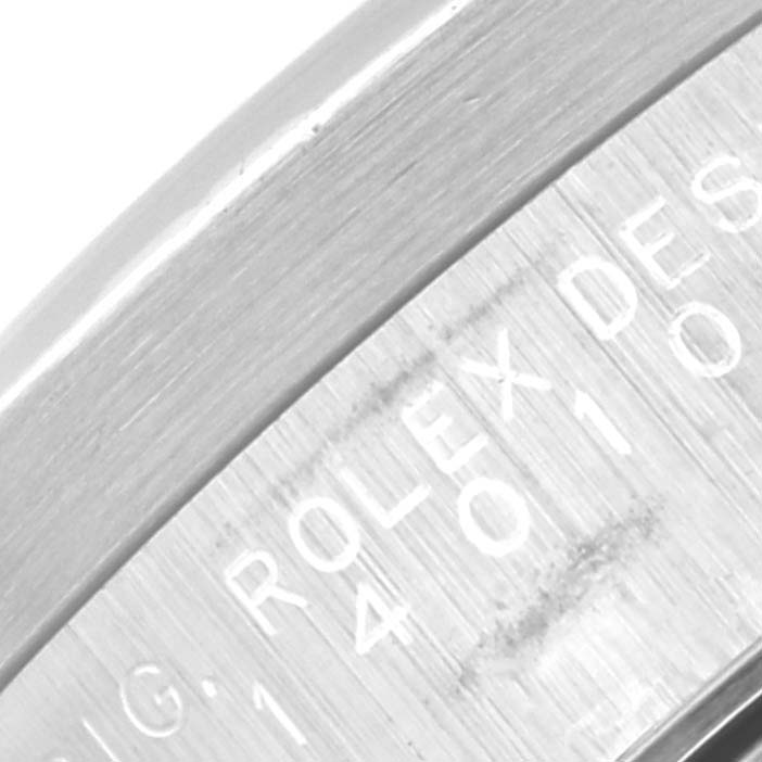 This close-up image shows the engraved edge of the bezel of a Rolex Air-King 14010 Men's Stainless Steel Black Dial 14010 Men's Stainless Steel Black Dial watch.