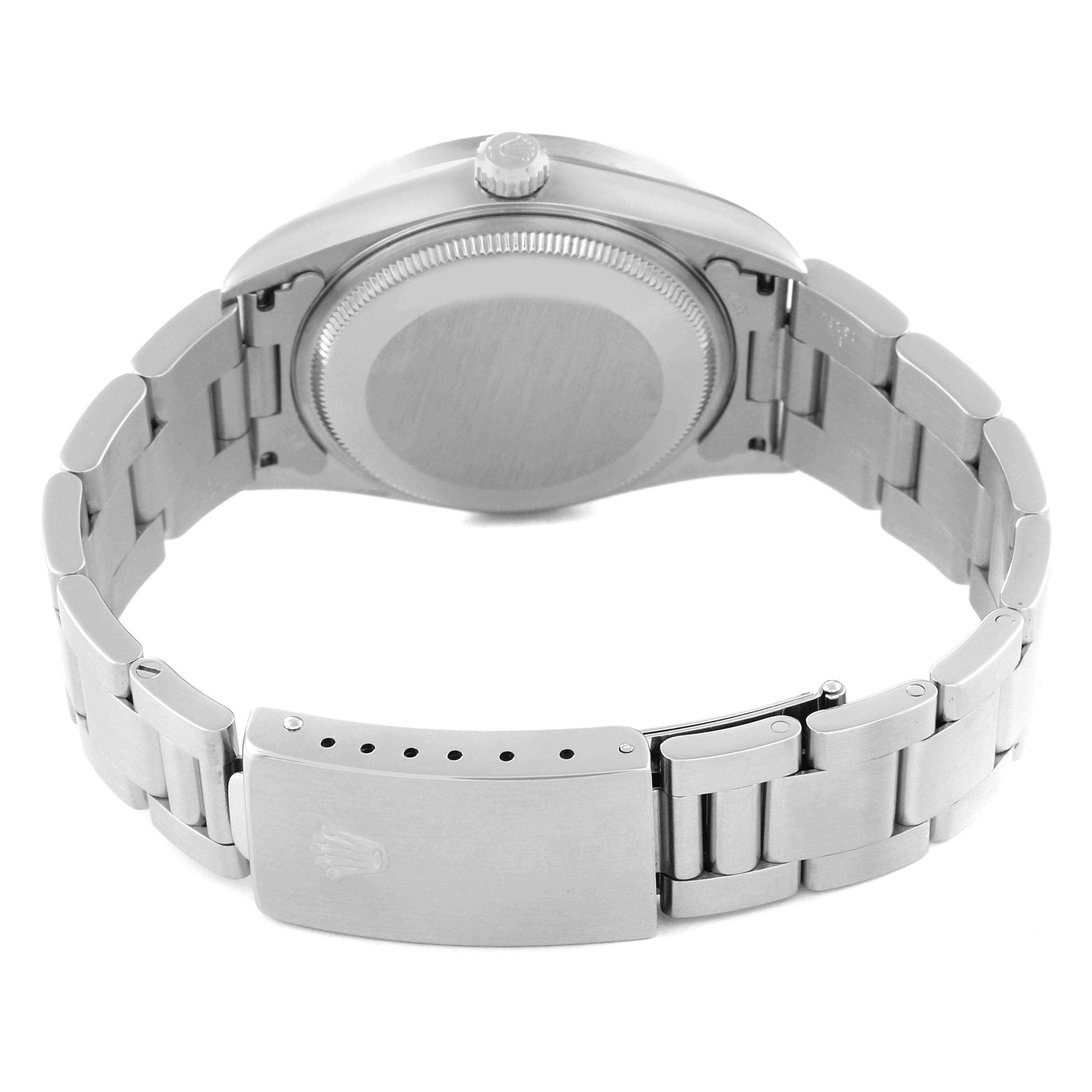 The image shows the back case and bracelet of a Rolex Air-King 14010 Men's Stainless Steel Black Dial 14010 Men's Stainless Steel Black Dial watch at a slightly elevated rear angle.