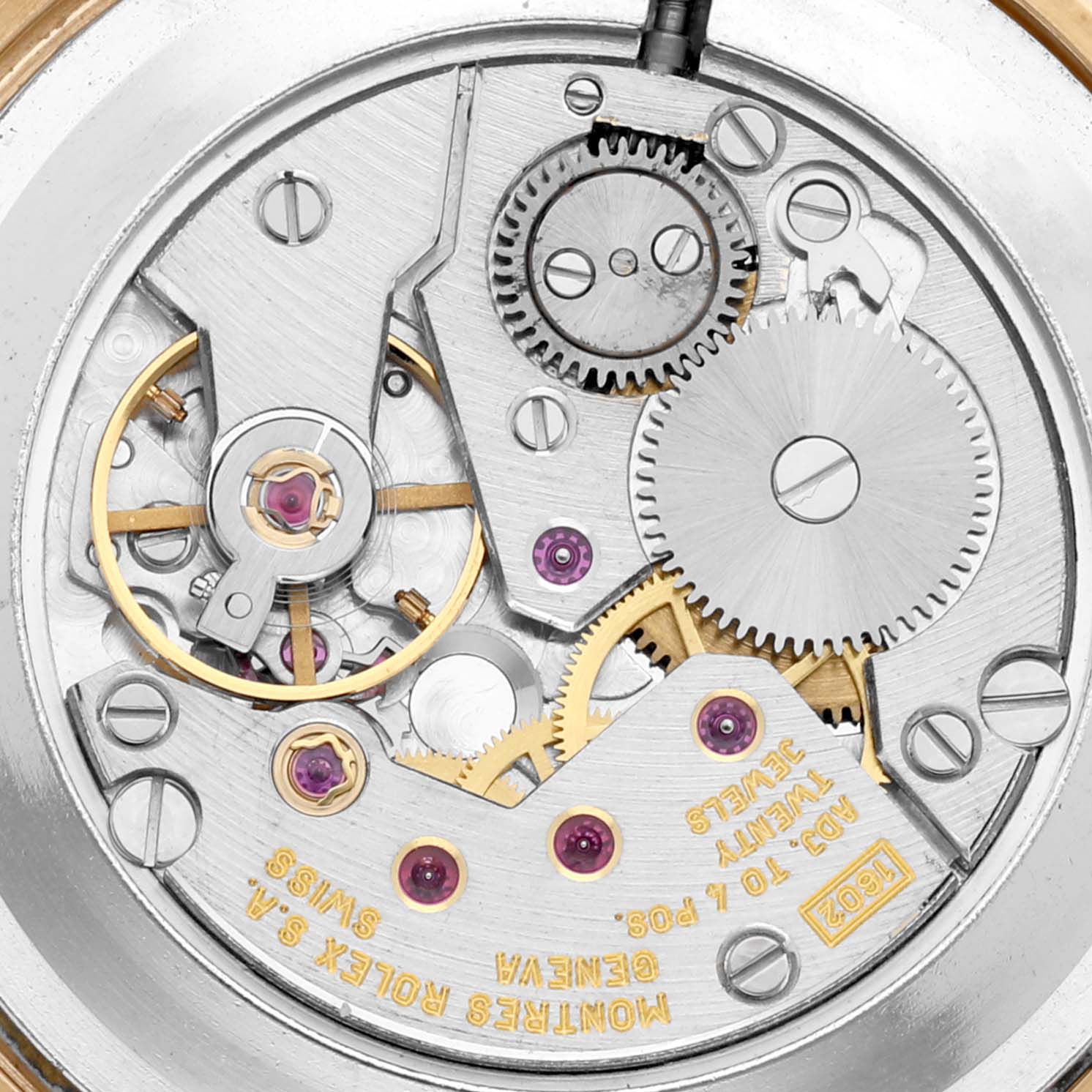 This is a close-up view of the internal movement mechanism of a Rolex Cellini 5112 Men's Yellow Gold White Dial 5112 Men's Yellow Gold White Dial watch.