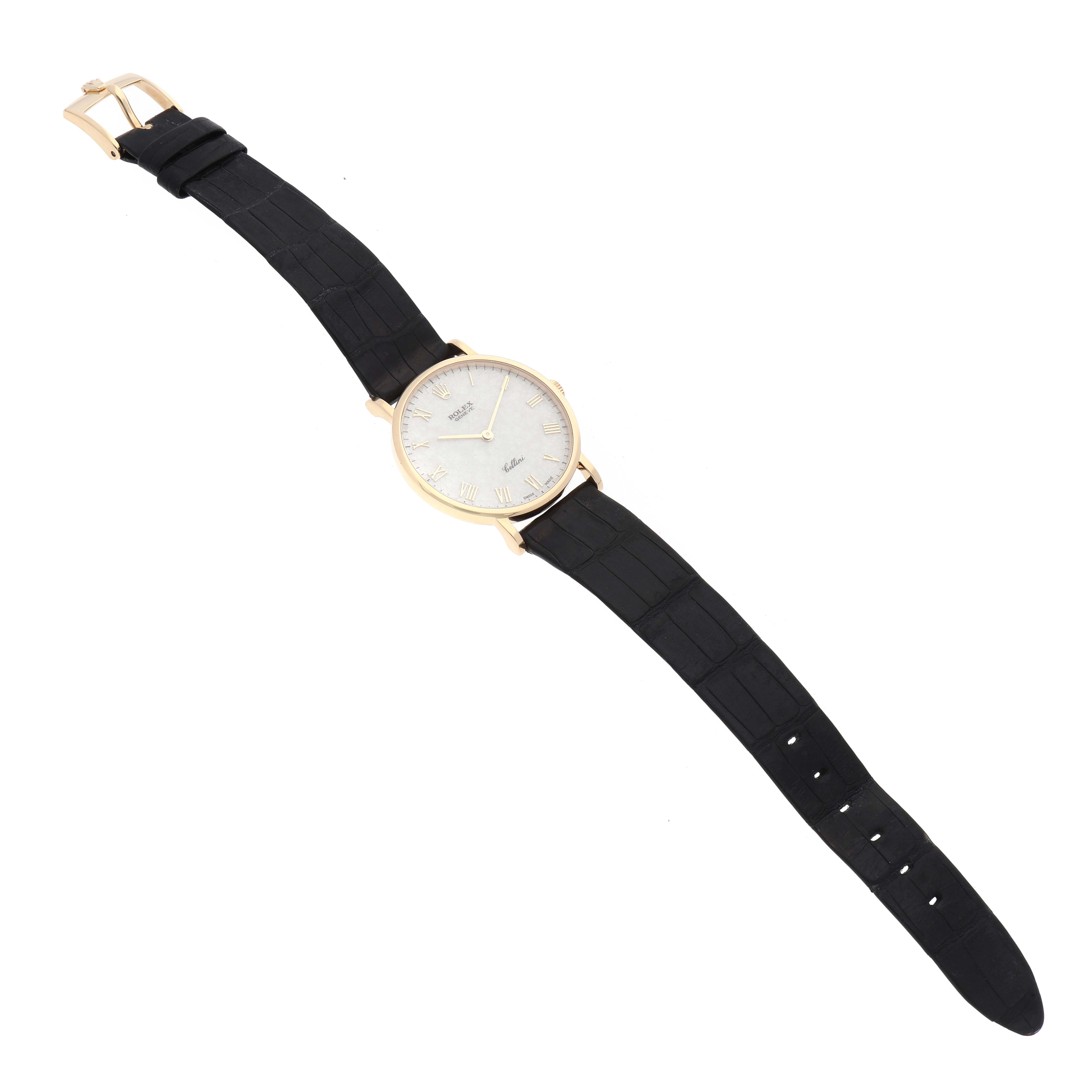 The Rolex Cellini 5112 Men's Yellow Gold White Dial 5112 Men's Yellow Gold White Dial model watch is shown from a top view, displaying its dial, case, and black strap with buckle.