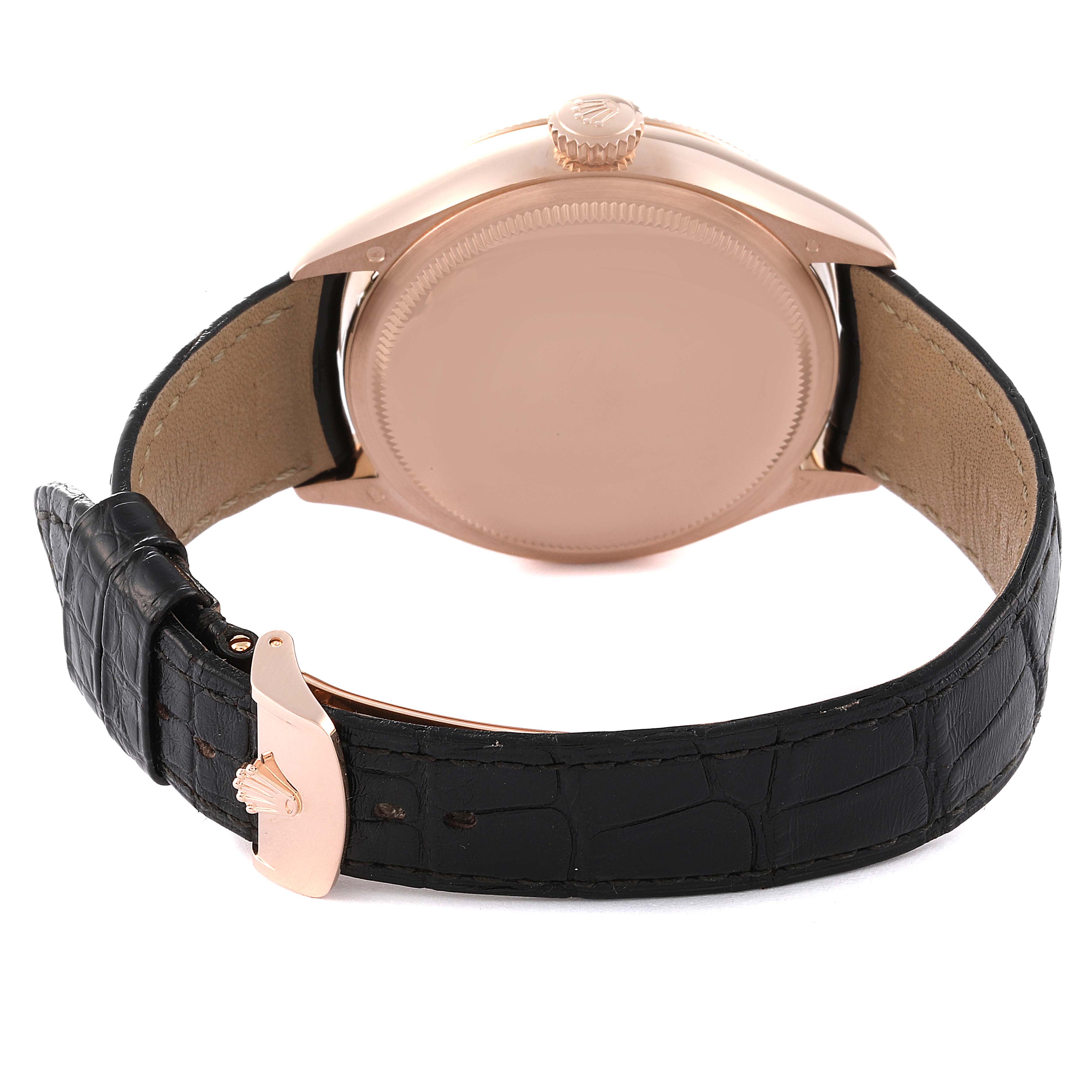 The image shows the back view of a Rolex Cellini 50535 Men's Rose Gold White Dial 50535 Men's Rose Gold White Dial watch, highlighting its case, crown, and black leather strap.