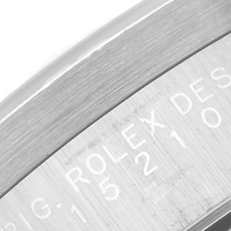 This image shows a close-up of the engraved rehaut on a Rolex Date 15210 Men's Stainless Steel Blue Dial 15210 Men's Stainless Steel Blue Dial model watch.