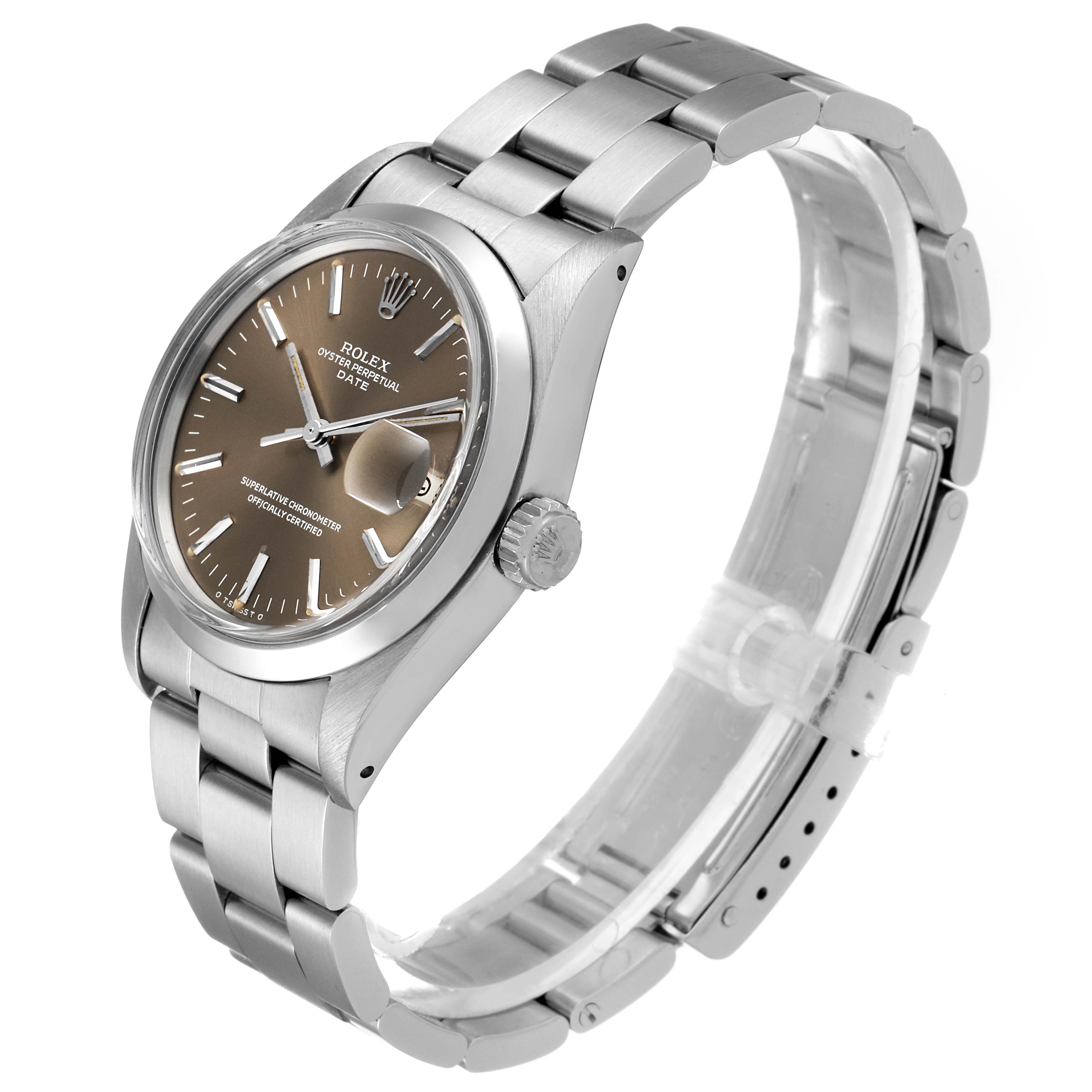 The image shows a Vintage Collection Rolex watch from a side angle, displaying its dial, bezel, crown, and metal bracelet.