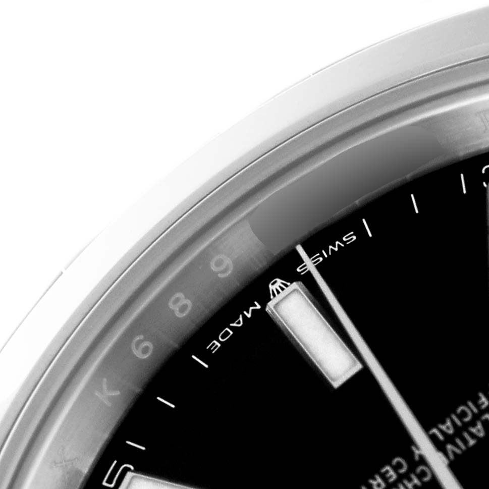 The image shows a close-up of the dial edge and indices of the Rolex Datejust 41 126300 Men
s Stainless Steel Black Dial 126300 Men
s Stainless Steel Black Dial, focusing on the "Swiss Made" text.