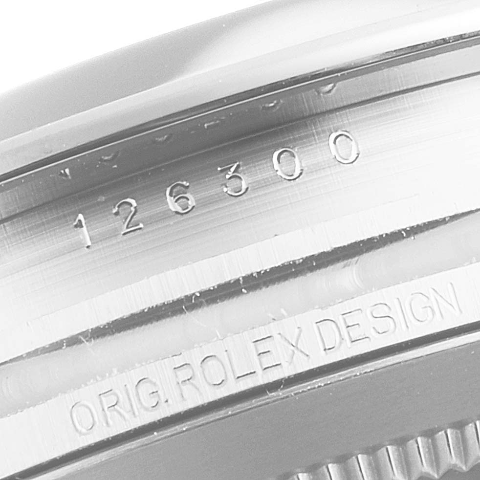 The image shows the engraved side of the case of a Rolex Datejust 41 126300 Men's Stainless Steel White Dial 126300 Men's Stainless Steel White Dial watch, highlighting its model number.