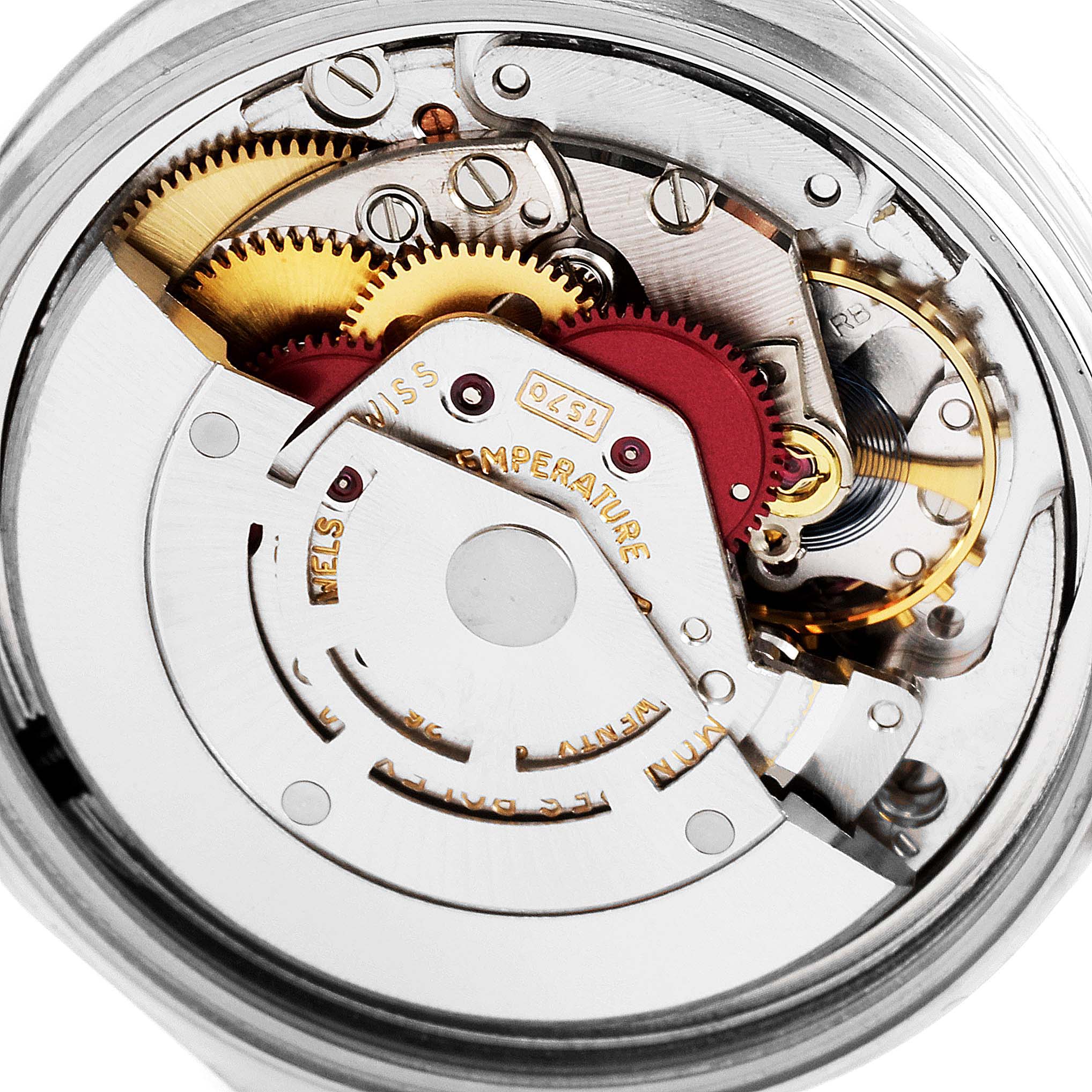 The image shows the internal mechanical movement and gears of a Vintage Collection model by Rolex from a rear angle.