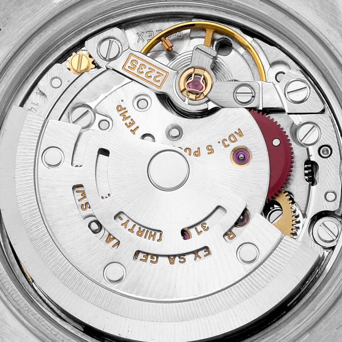 This image shows a close-up view of the movement mechanism inside a Rolex Datejust 79174 Women's Stainless Steel Blue Dial 79174 Women's Stainless Steel Blue Dial watch.