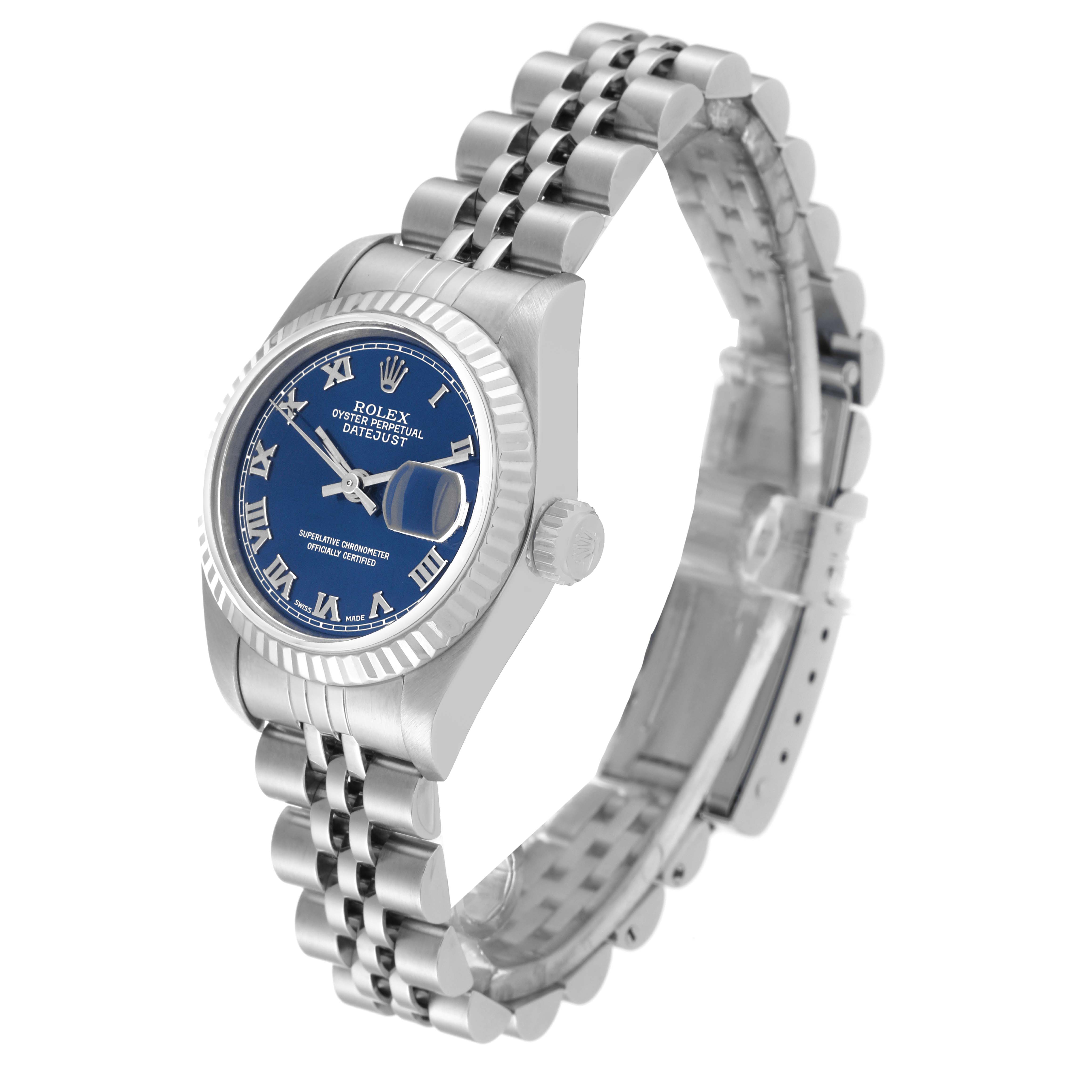 This image shows a Rolex Datejust 79174 Women's Stainless Steel Blue Dial 79174 Women's Stainless Steel Blue Dial watch at a slight angle, highlighting the blue dial, fluted bezel, and jubilee bracelet.