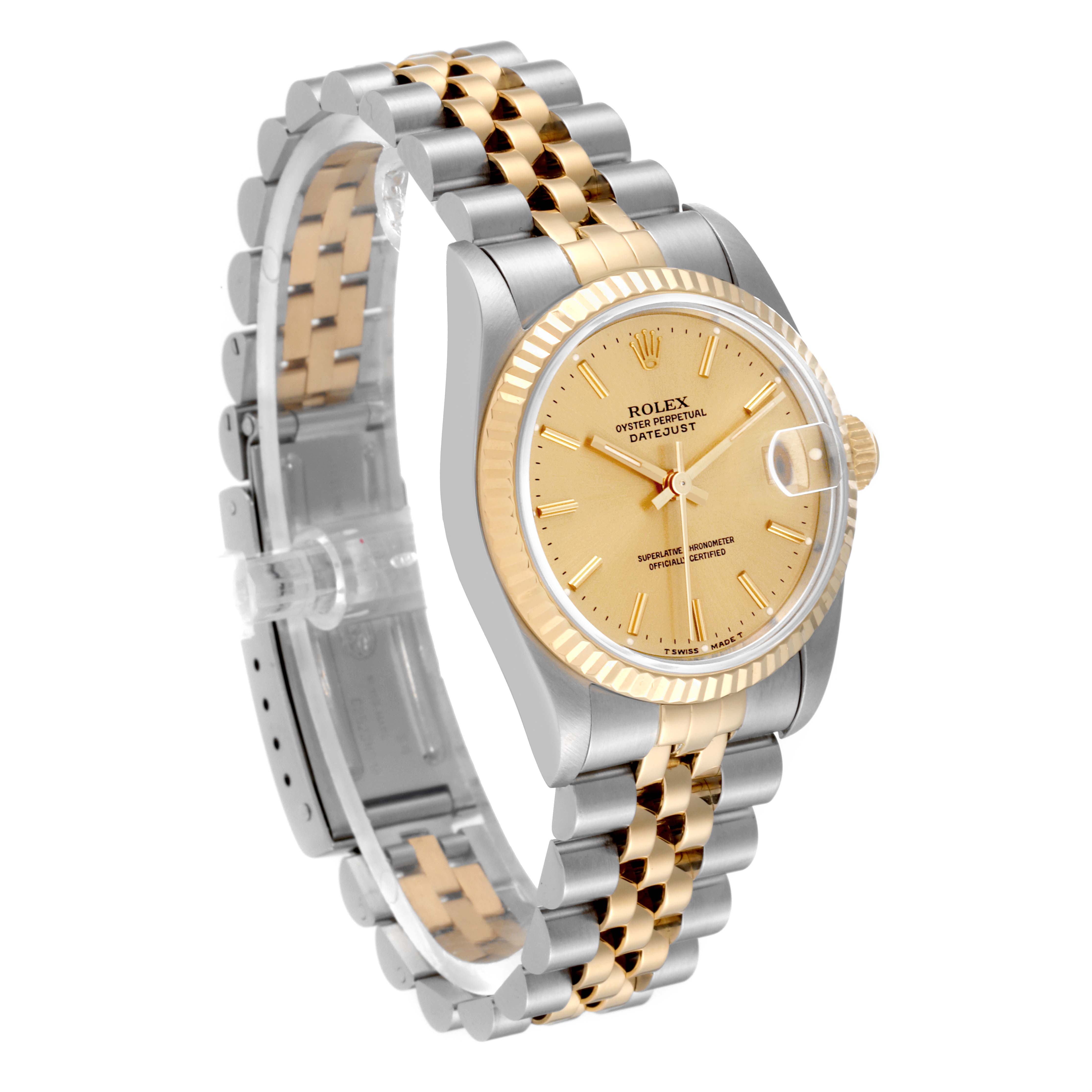 The image shows a Rolex Mid-Size 68273 Women's Steel and Gold (two tone) Champagne Dial 68273 Women's Steel and Gold (two tone) Champagne Dial Oyster Perpetual Datejust watch from an angle showcasing its dial, bezel, and two-tone bracelet.