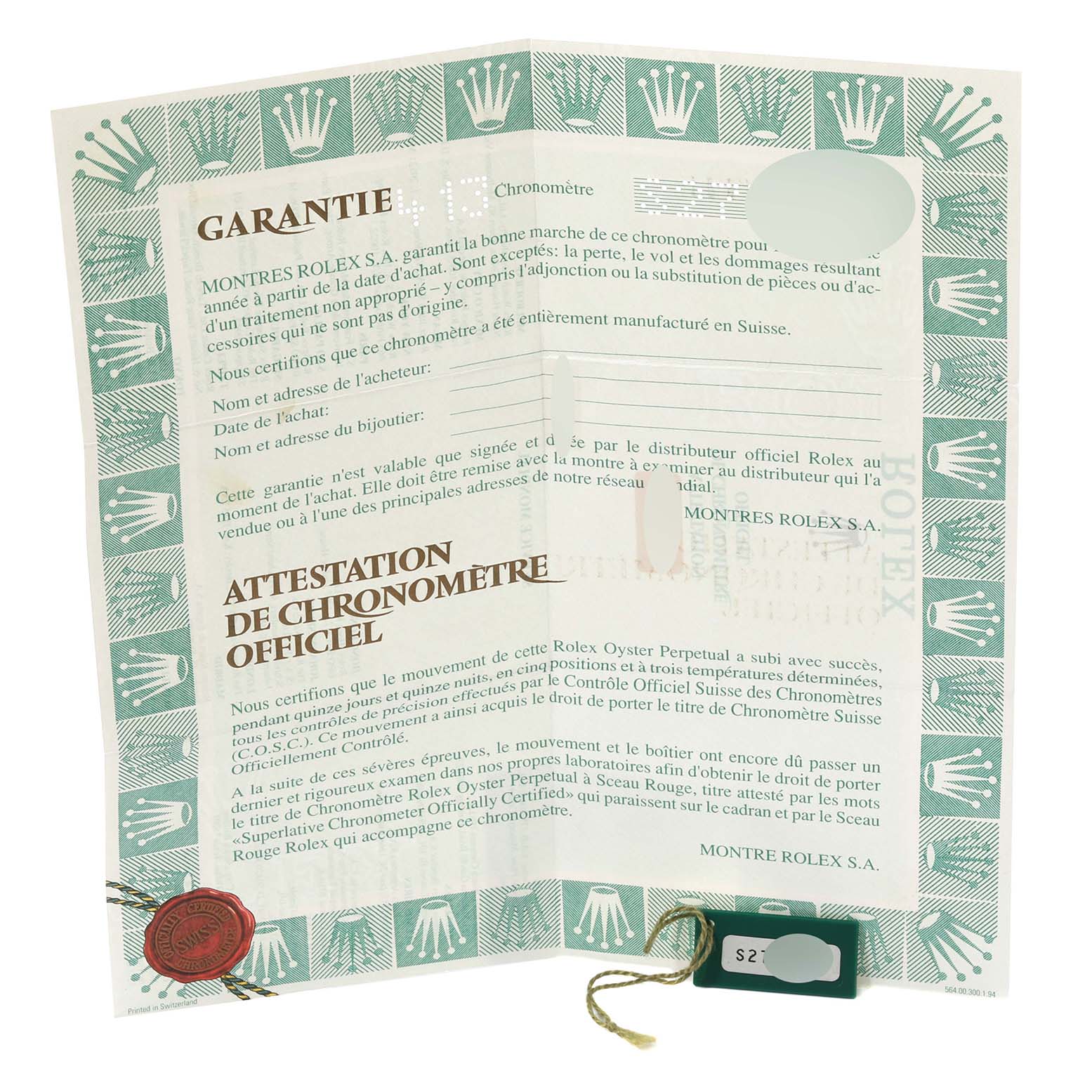 The image shows the guarantee and chronometer certificate documents for a Mid-Size Rolex watch.