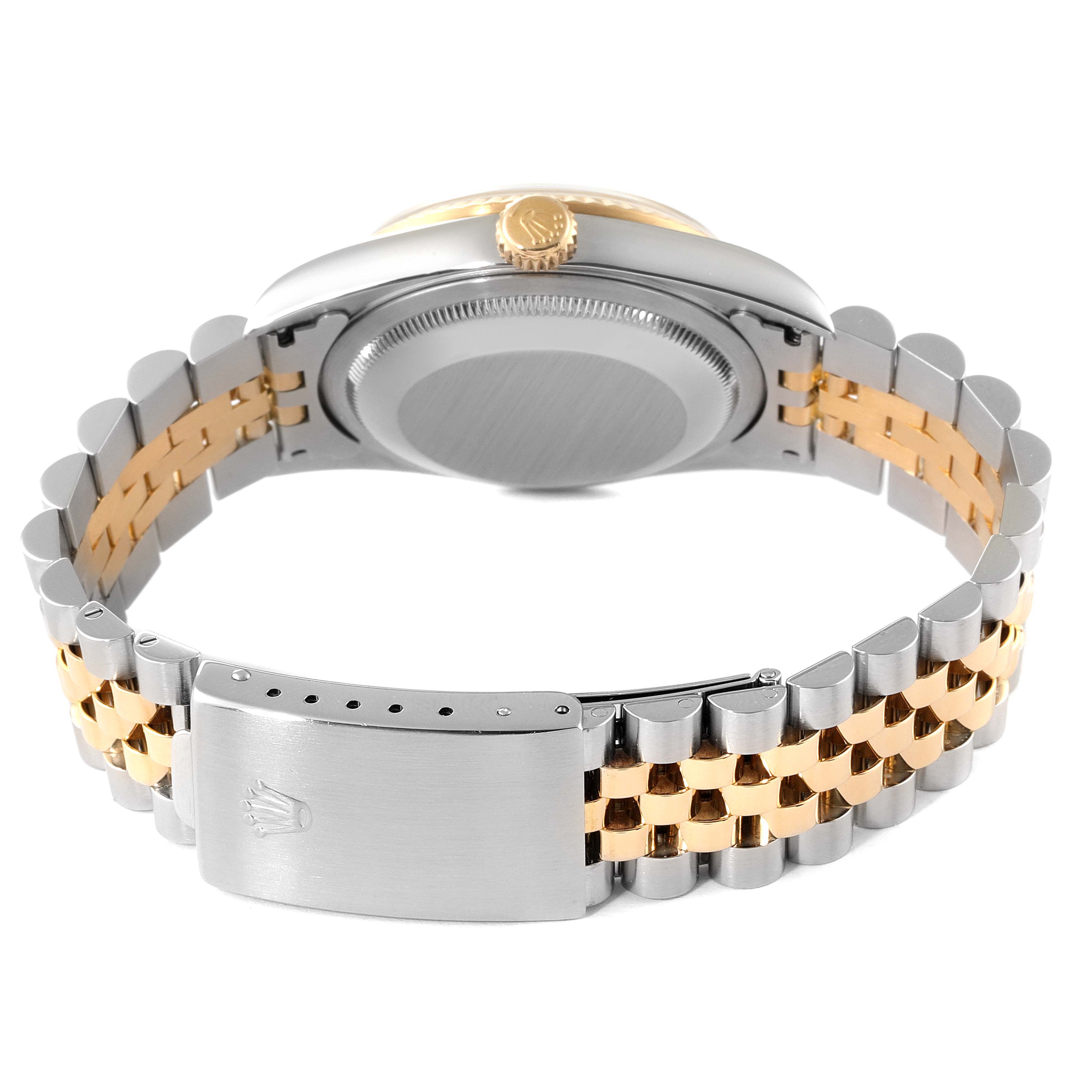 The image shows the back and bracelet of a Rolex Datejust 16233 Men's Steel and Gold (two tone) Champagne Dial 16233 Men's Steel and Gold (two tone) Champagne Dial watch, highlighting its two-tone metal finish and clasp.