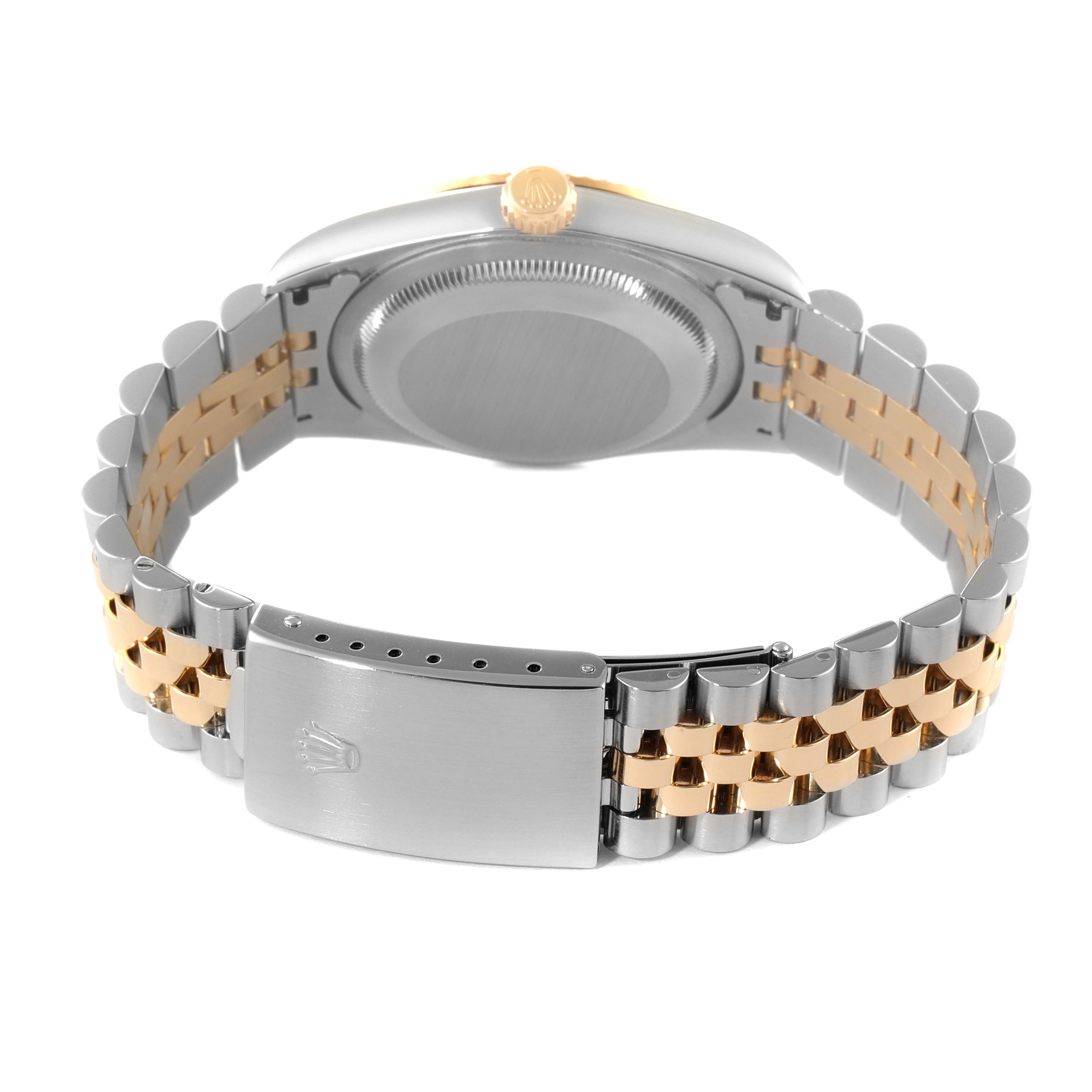 The image shows the back view of a Rolex Datejust 16233 Men's Steel and Gold (two tone) Black Dial 16233 Men's Steel and Gold (two tone) Black Dial watch highlighting its case back, crown, and two-tone Jubilee bracelet with clasp.