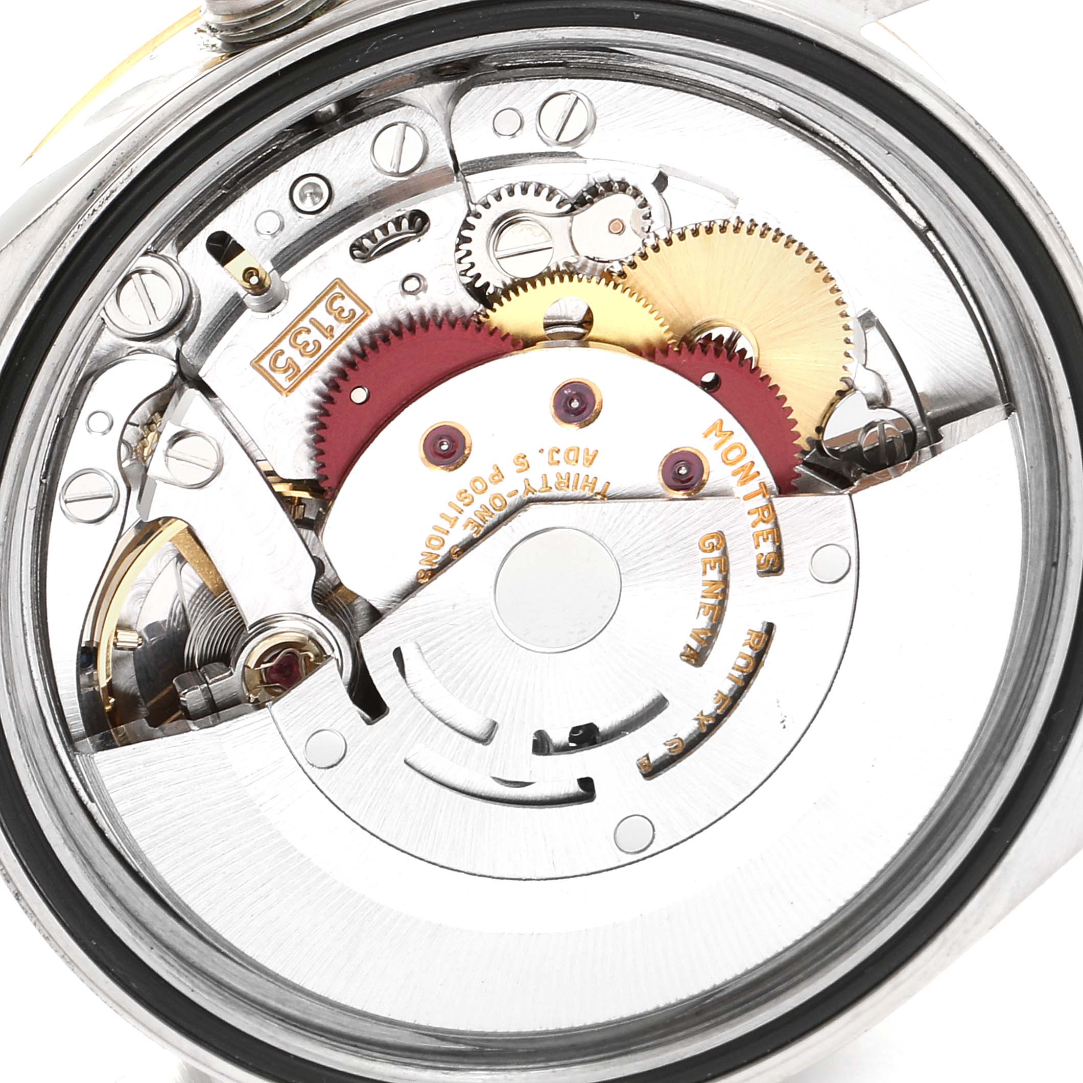 This image shows the internal movement of a Rolex Datejust 16233 Men's Steel and Gold (two tone) Champagne Dial 16233 Men's Steel and Gold (two tone) Champagne Dial watch, specifically showcasing its gears and components.