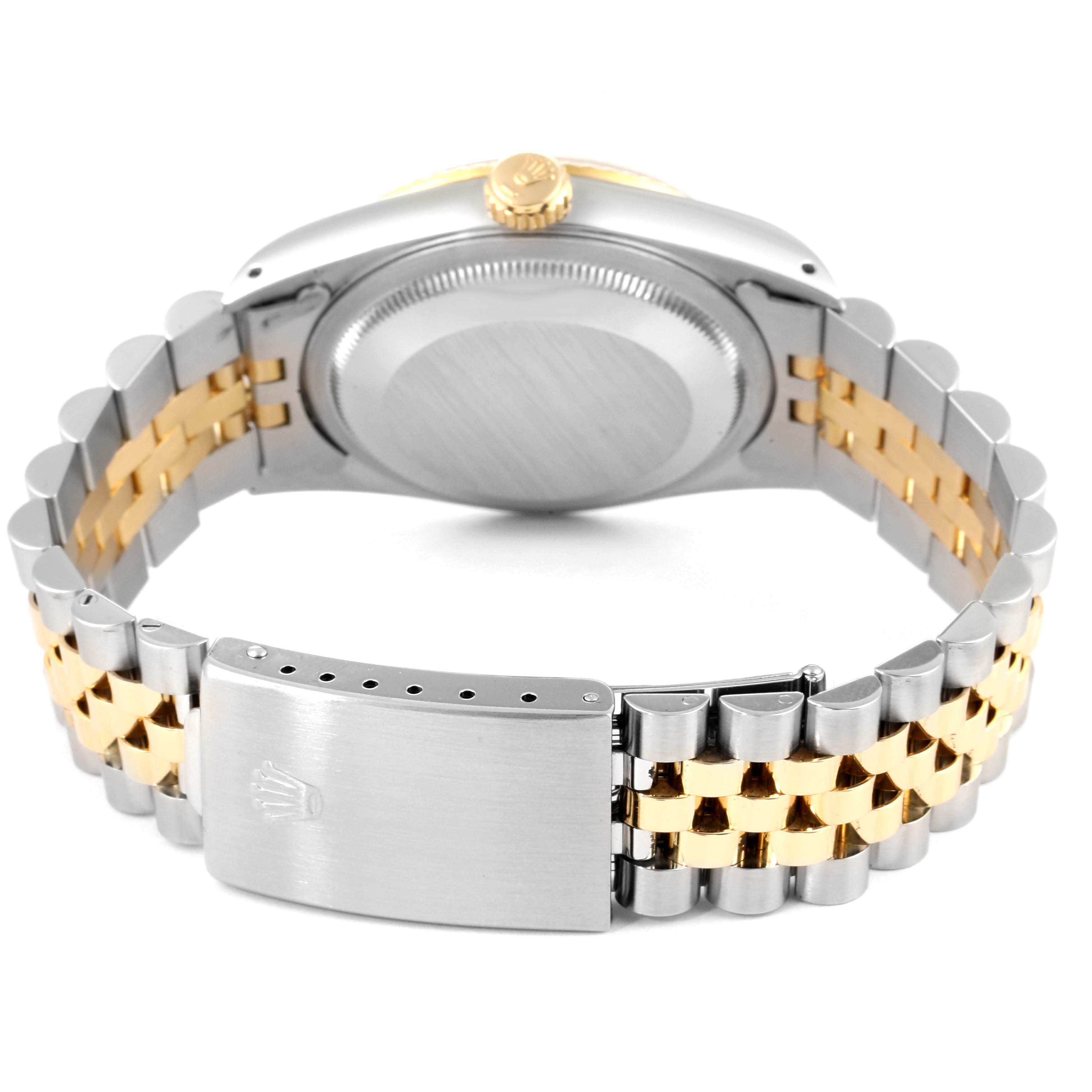 The image shows the back case and the Jubilee bracelet of a Rolex Datejust 16233 Men's Steel and Gold (two tone) Champagne Dial 16233 Men's Steel and Gold (two tone) Champagne Dial watch.