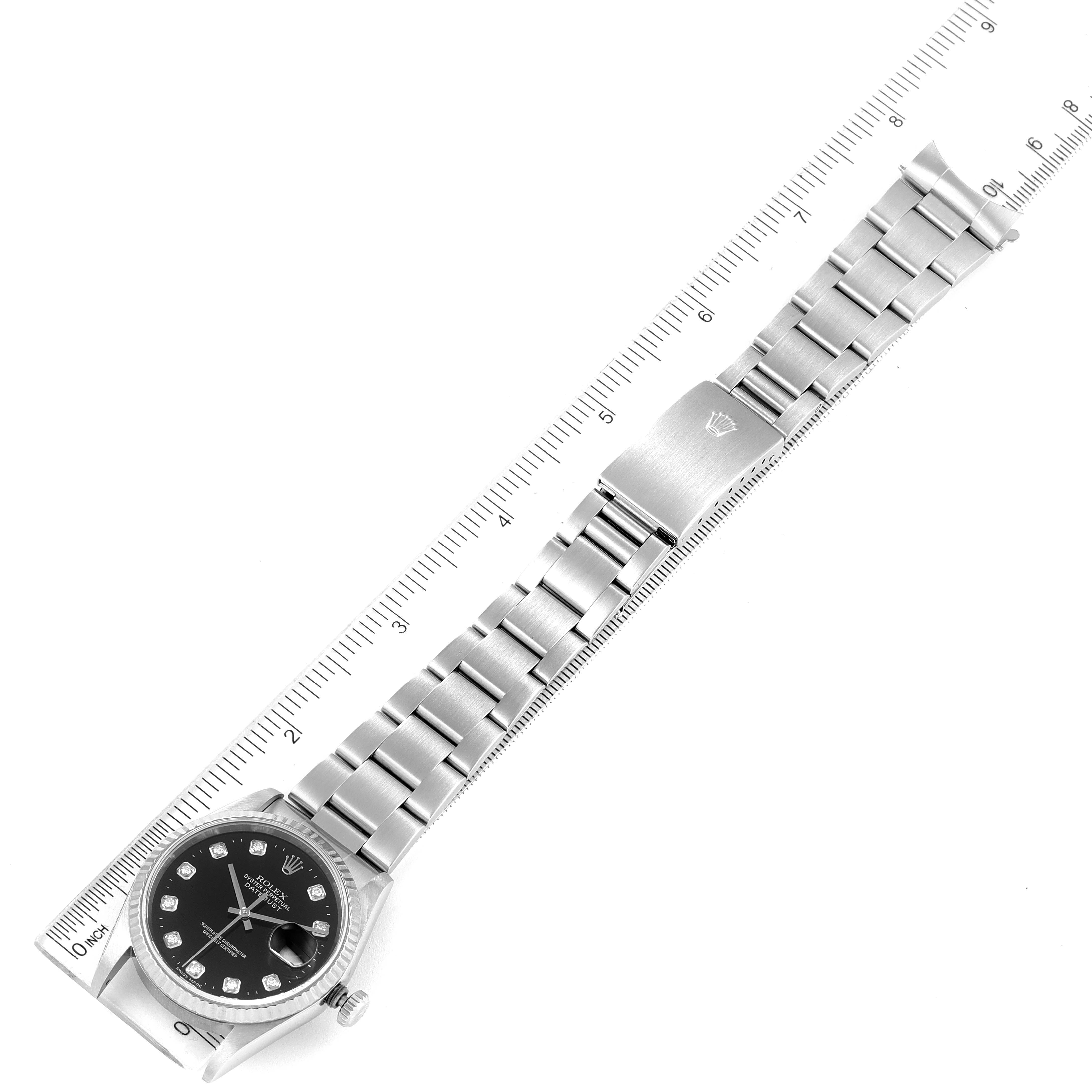 The Rolex Datejust 16234 Men
s Stainless Steel Black Dial 16234 Men
s Stainless Steel Black Dial watch is shown from a top-down angle with the face, bracelet, and clasp visible, measured alongside a ruler.