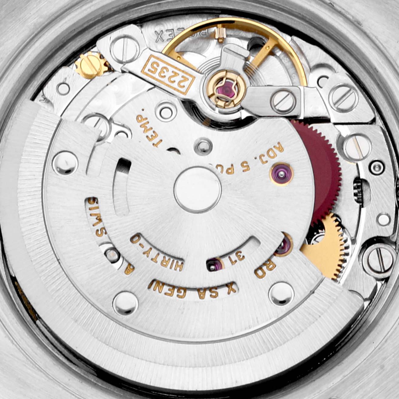 This image shows a close-up view of the Rolex Datejust 179173 Women's Steel and Gold (two tone) Black Dial 179173 Women's Steel and Gold (two tone) Black Dial watch's internal movement mechanism from the back.
