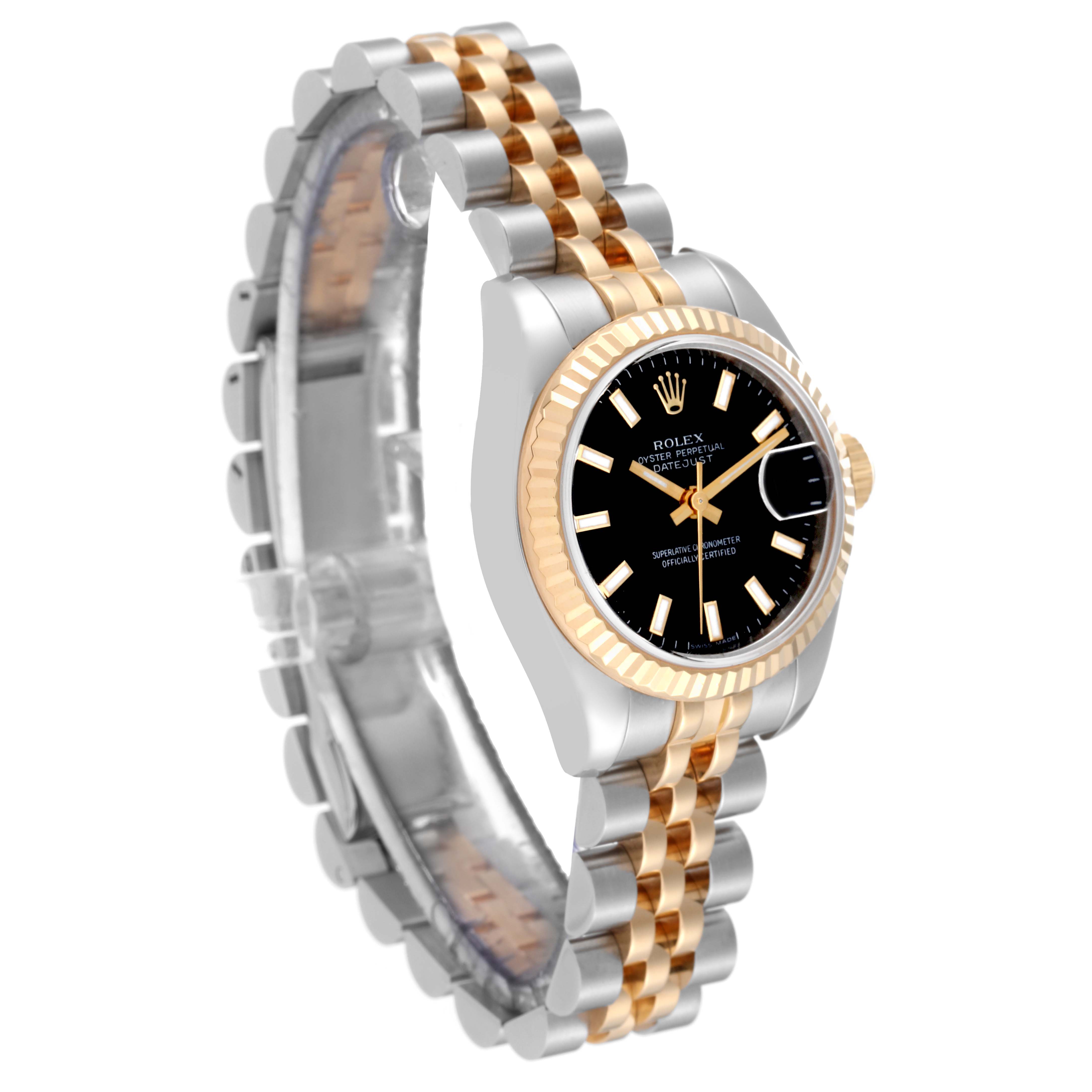 The image shows a Rolex Datejust 179173 Women's Steel and Gold (two tone) Black Dial 179173 Women's Steel and Gold (two tone) Black Dial watch at an angled side view, highlighting its two-tone bracelet and the black dial with a fluted bezel.