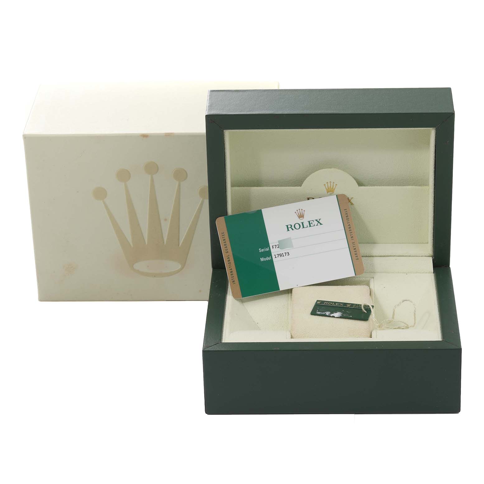 This image shows the packaging of a Rolex Datejust 179173 Women's Steel and Gold (two tone) Black Dial 179173 Women's Steel and Gold (two tone) Black Dial watch, including the box, warranty card, and tags.