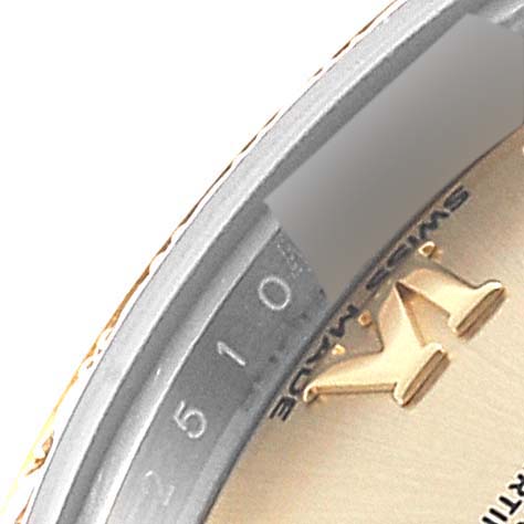 This image shows a close-up of the dial and edge of the bezel of a Rolex Datejust 279383 Women's Steel and Gold (two tone) Champagne Dial 279383 Women's Steel and Gold (two tone) Champagne Dial watch, highlighting the model's intricate details.