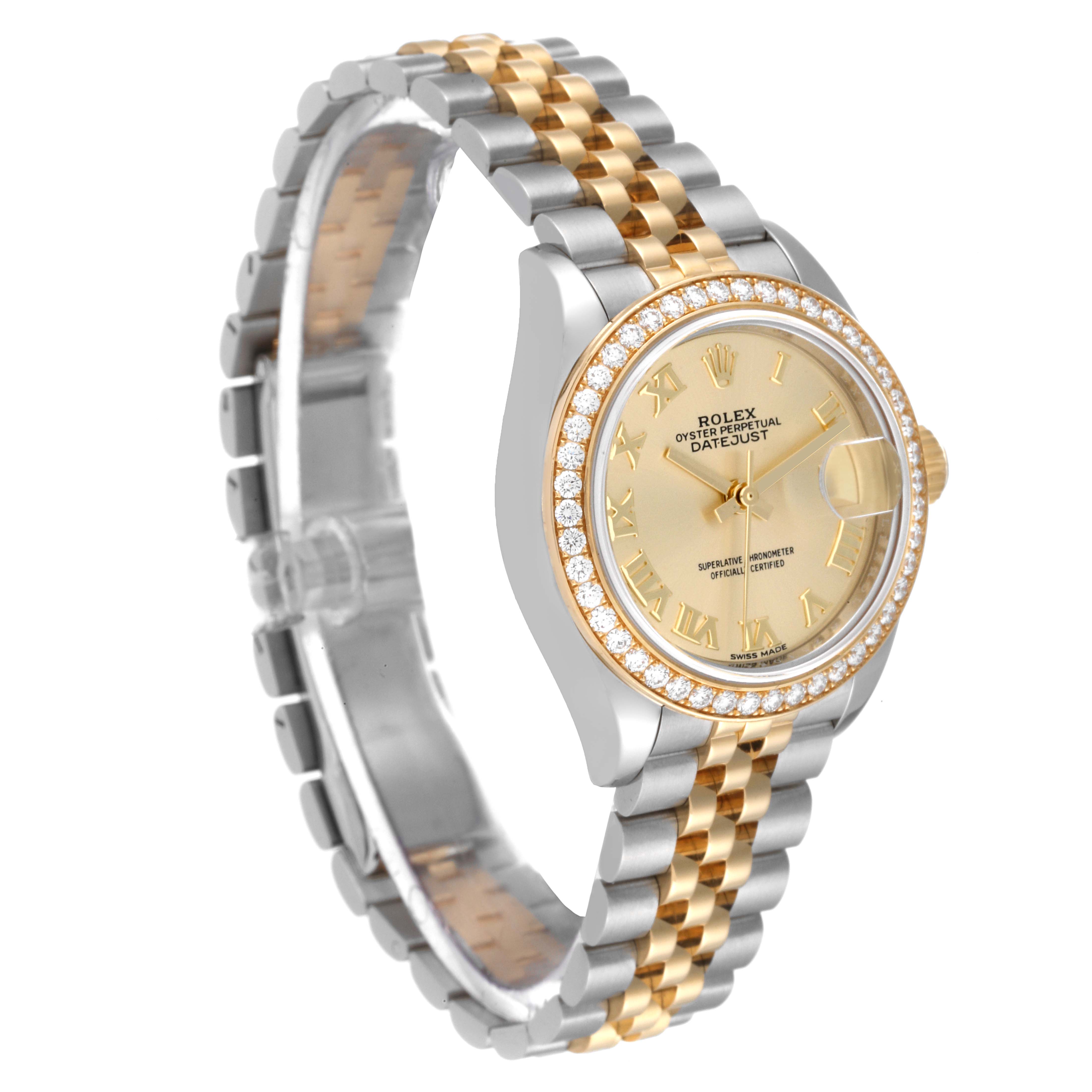 This Rolex Datejust 279383 Women's Steel and Gold (two tone) Champagne Dial 279383 Women's Steel and Gold (two tone) Champagne Dial watch is shown at an angled view featuring its two-tone bracelet, golden dial, and diamond-encrusted bezel.
