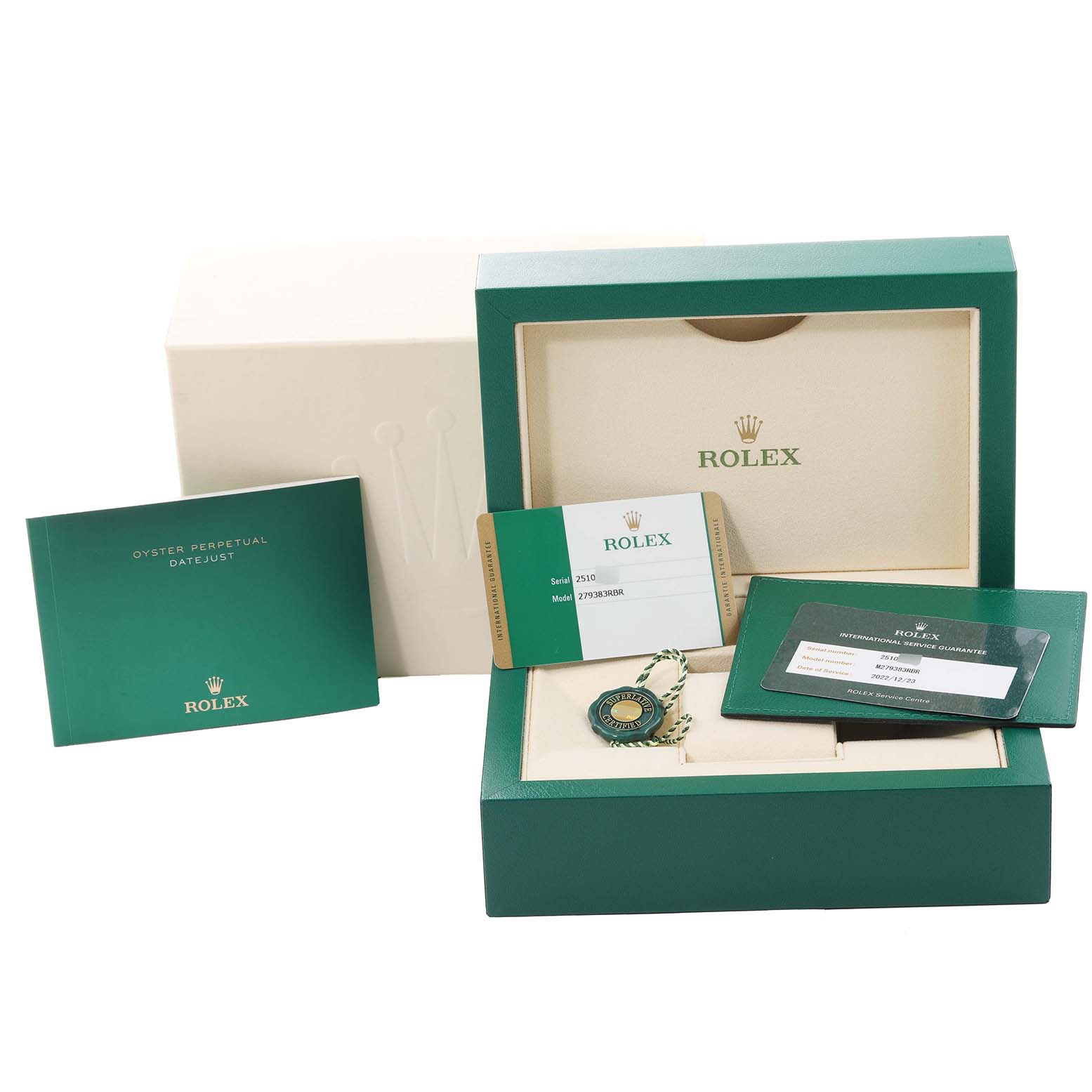 The image shows a Rolex Datejust 279383 Women's Steel and Gold (two tone) Champagne Dial 279383 Women's Steel and Gold (two tone) Champagne Dial watch box including the booklet, guarantee card, hangtag, and cardholder.