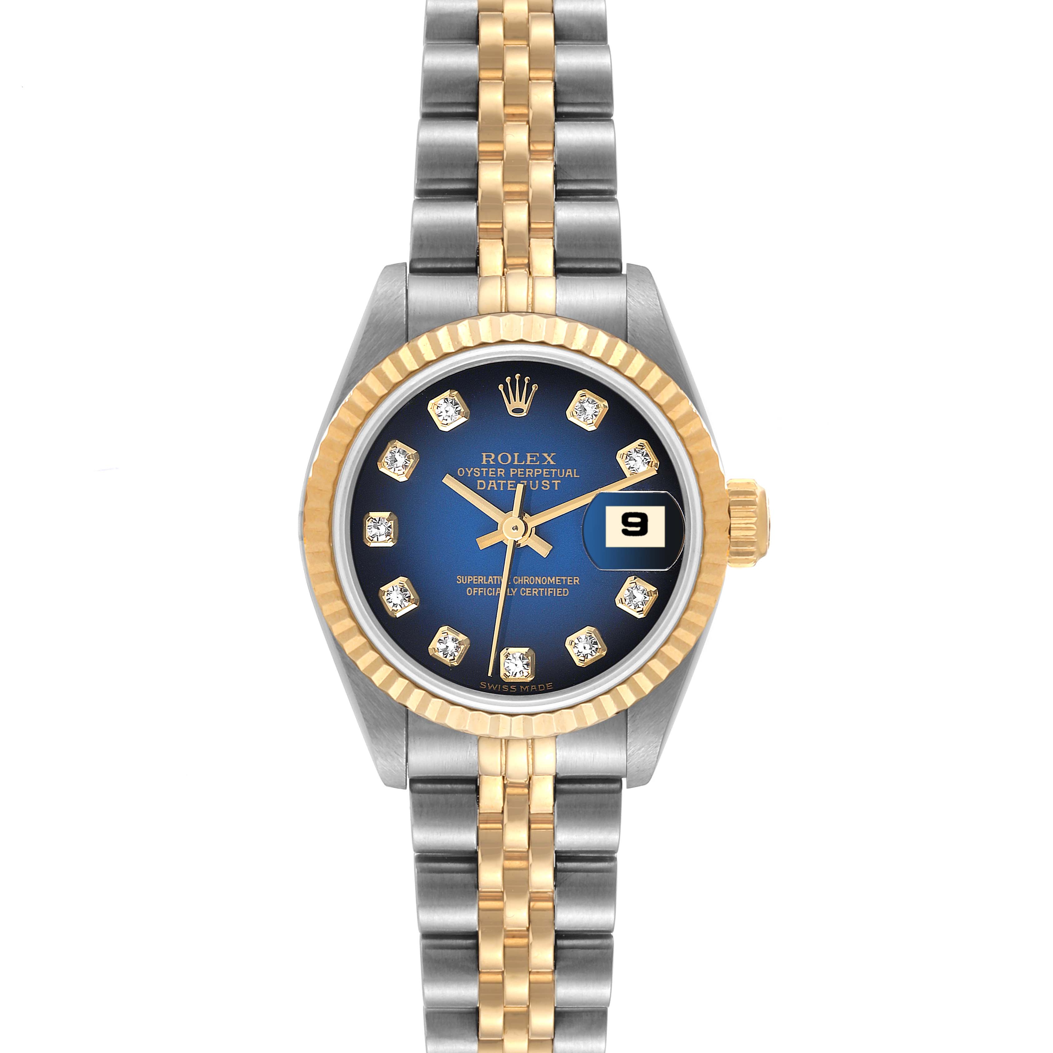 The image shows a frontal view of a Rolex Datejust 79173 Women's Steel and Gold (two tone) Blue Dial 79173 Women's Steel and Gold (two tone) Blue Dial watch with a two-tone bracelet, blue dial, and diamond hour markers.