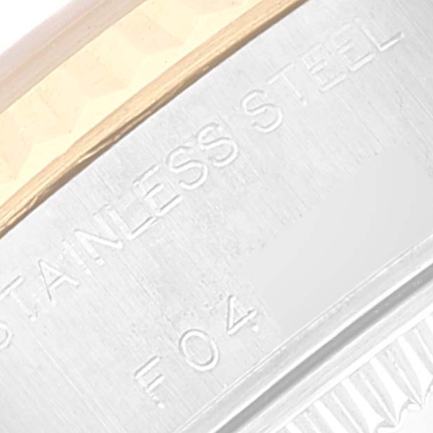 This close-up image shows the stainless steel and gold bezel of a Rolex Datejust 79173 Women's Steel and Gold (two tone) Blue Dial 79173 Women's Steel and Gold (two tone) Blue Dial watch.