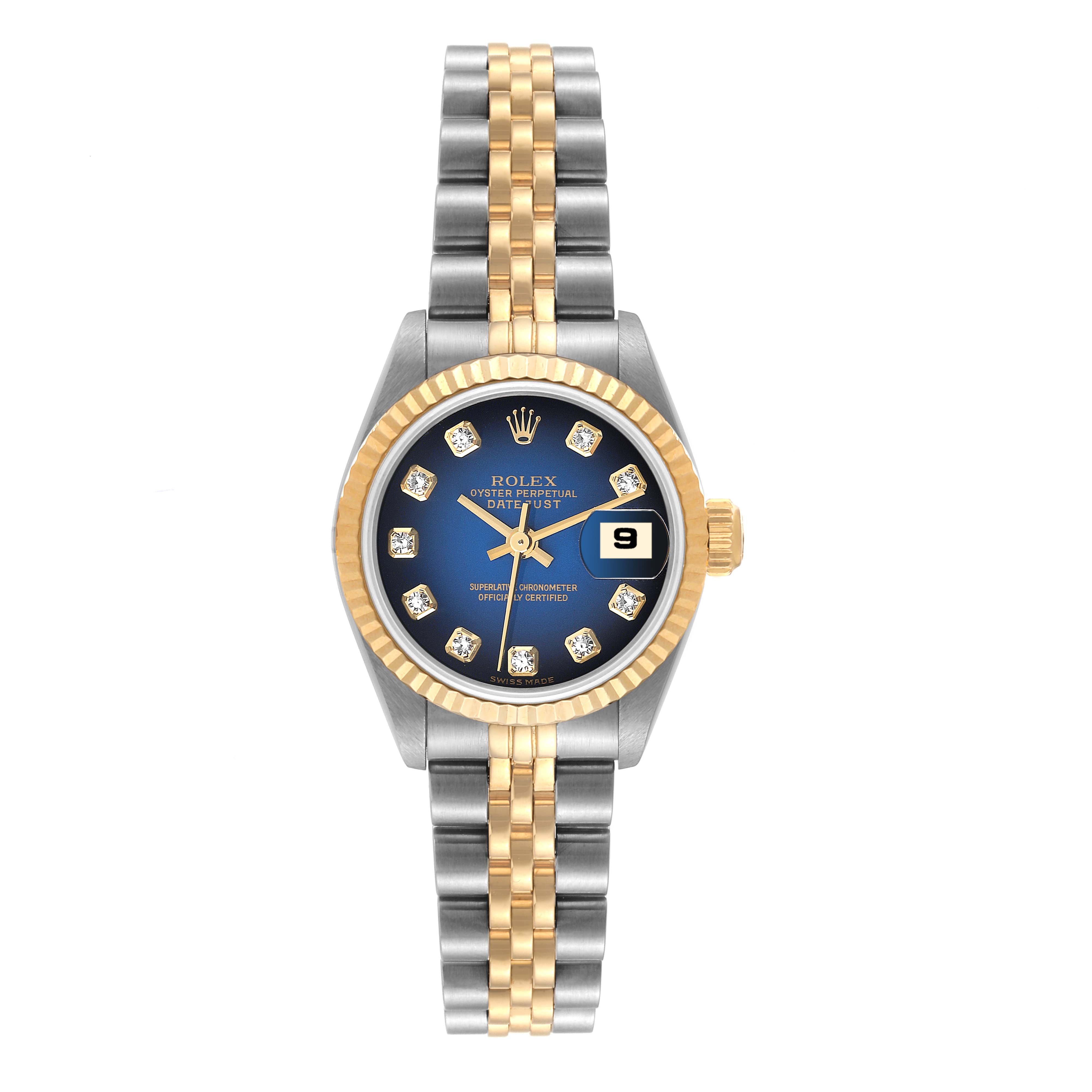 The image shows a front view of a Rolex Datejust 79173 Women's Steel and Gold (two tone) Blue Dial 79173 Women's Steel and Gold (two tone) Blue Dial watch, featuring a blue dial, diamond hour markers, and a two-tone bracelet.