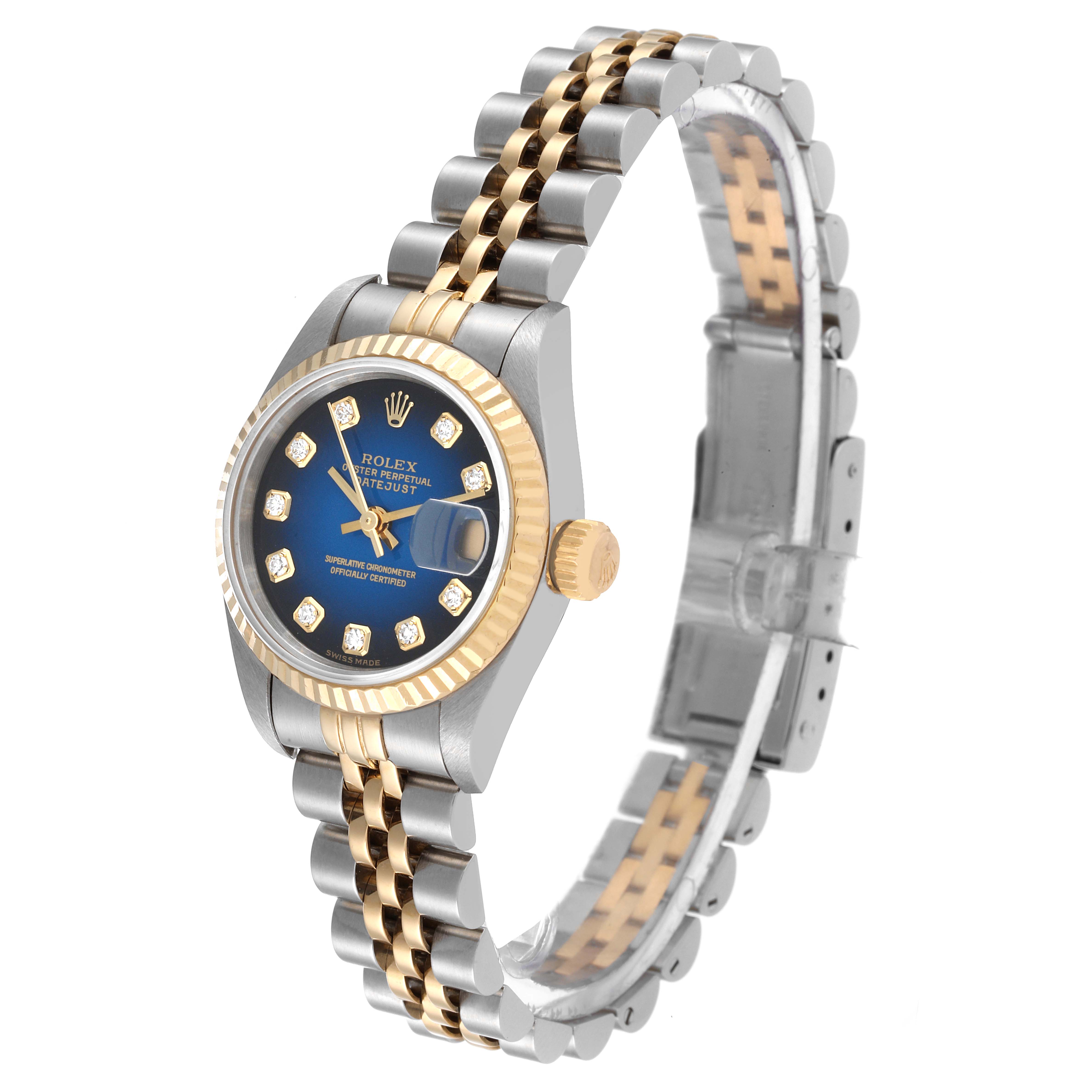The Rolex Datejust 79173 Women's Steel and Gold (two tone) Blue Dial 79173 Women's Steel and Gold (two tone) Blue Dial watch is shown at an angle highlighting the bezel, dial, crown, and two-tone bracelet.