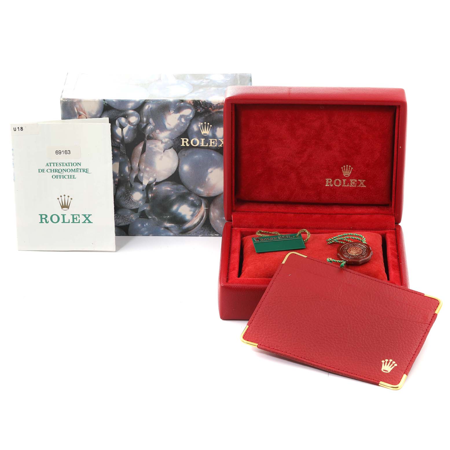 The image shows a Rolex Datejust 69163 Women's Steel and Gold (two tone) White Dial 69163 Women's Steel and Gold (two tone) White Dial watch box, warranty card, manual, and accessories from an overhead angle.