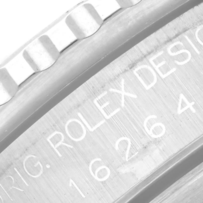 The image shows a close-up of the bezel and side case of a Rolex Turn-o-Graph 16264 Men's Stainless Steel Black Dial 16264 Men's Stainless Steel Black Dial watch, highlighting the engraved model number.