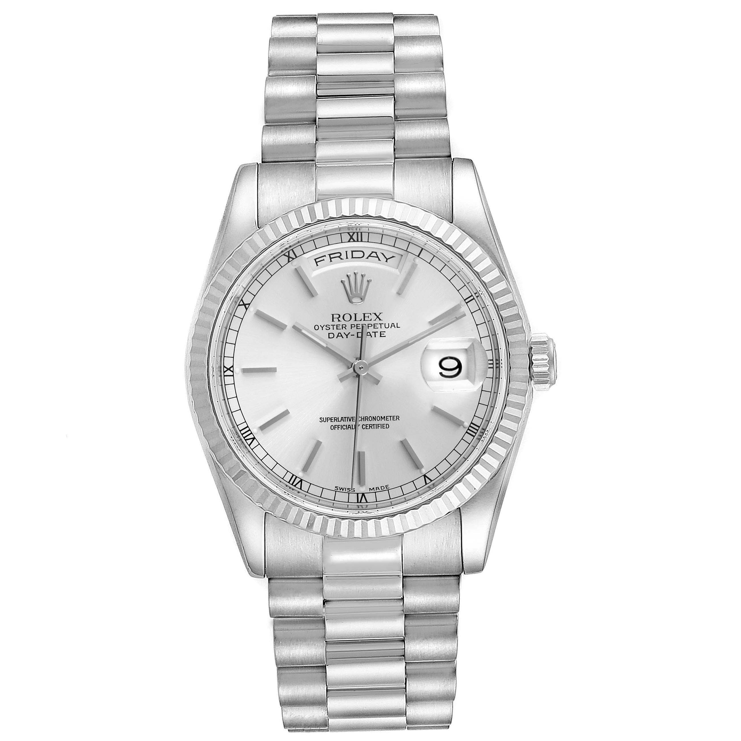 The image shows a Rolex President 118239 Men
s White Gold Silver Dial 118239 Men
s White Gold Silver Dial model watch from a top-down view, highlighting the dial, day-date display, bezel, and bracelet.