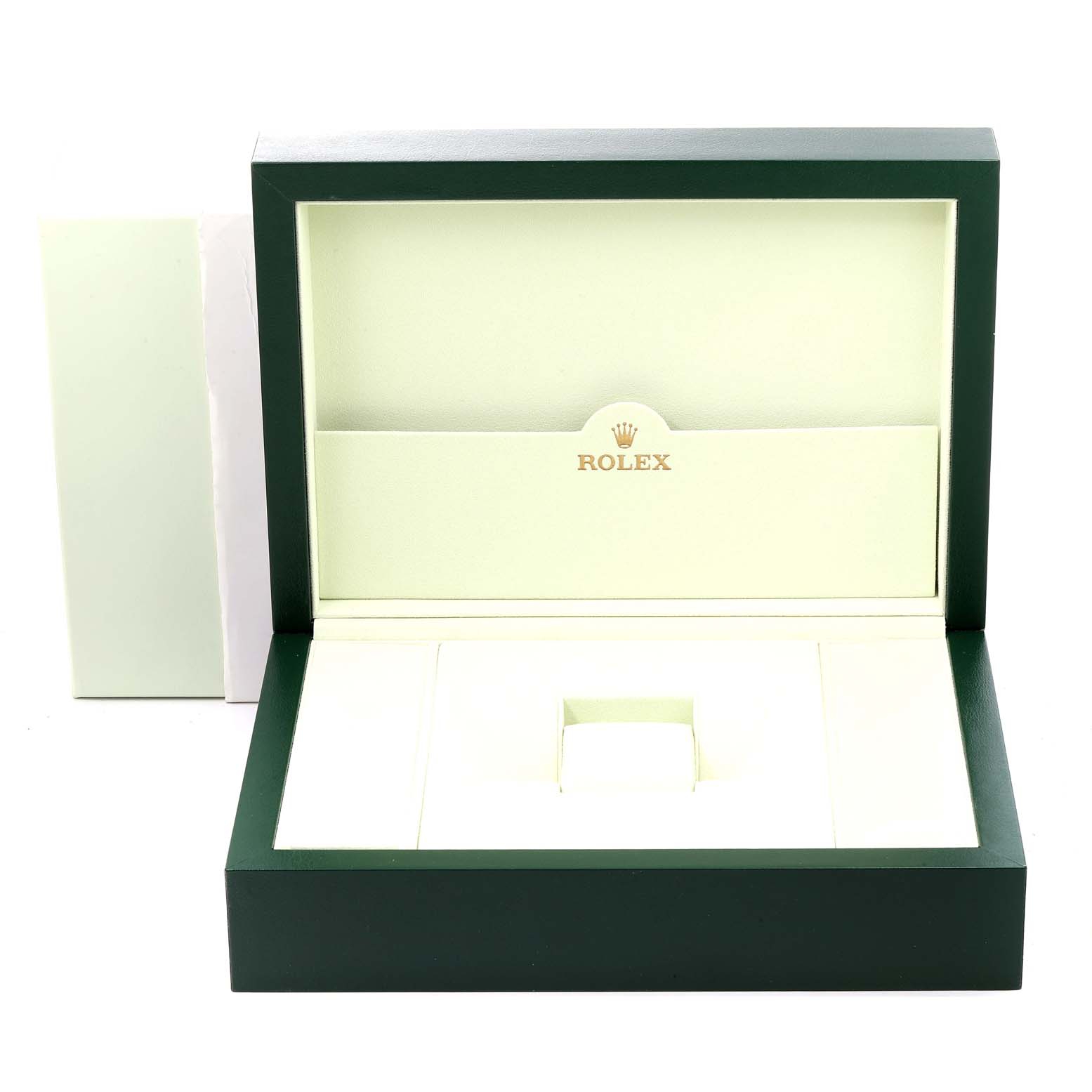 The image shows an open Rolex box, typically used to package the President model watch.