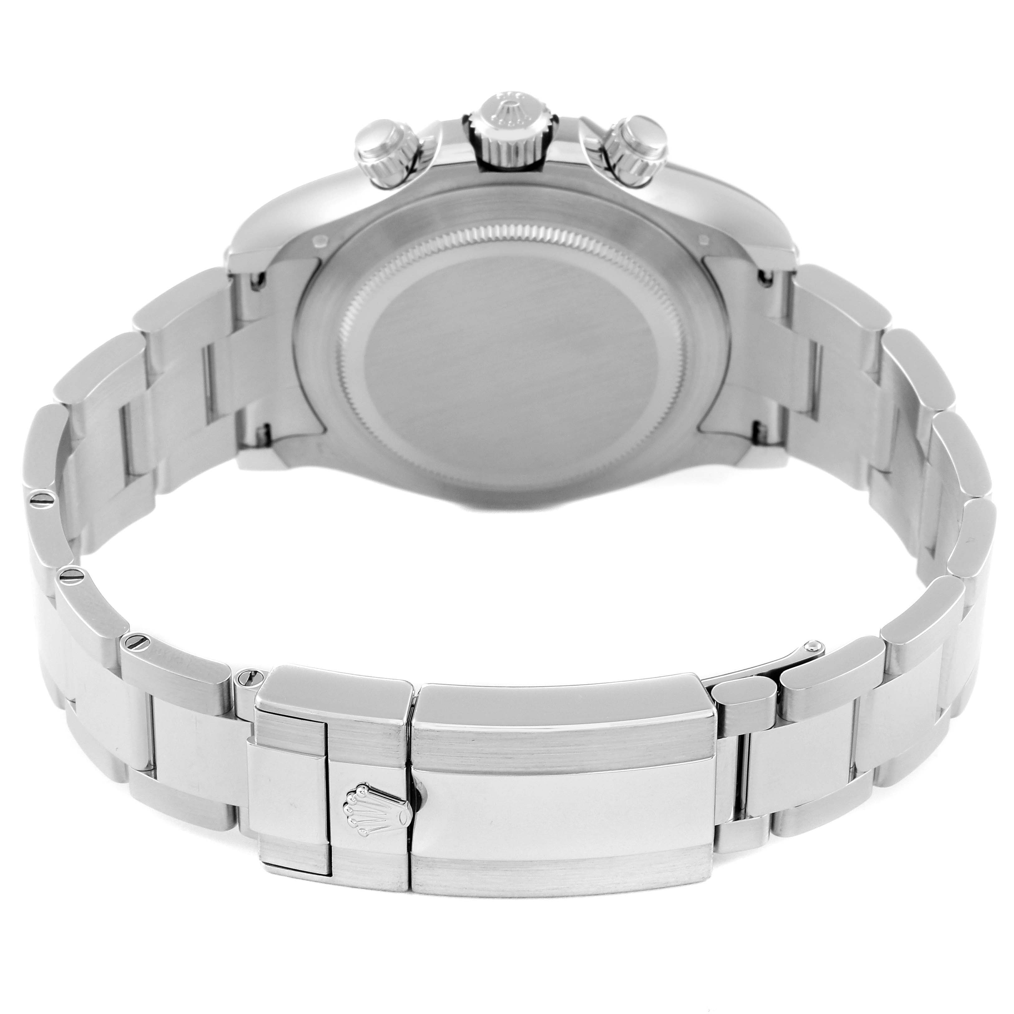 The image shows the back view of a Rolex Daytona 116506 Men's Platinum Blue Dial 116506 Men's Platinum Blue Dial watch, highlighting its bracelet, clasp, and case back.