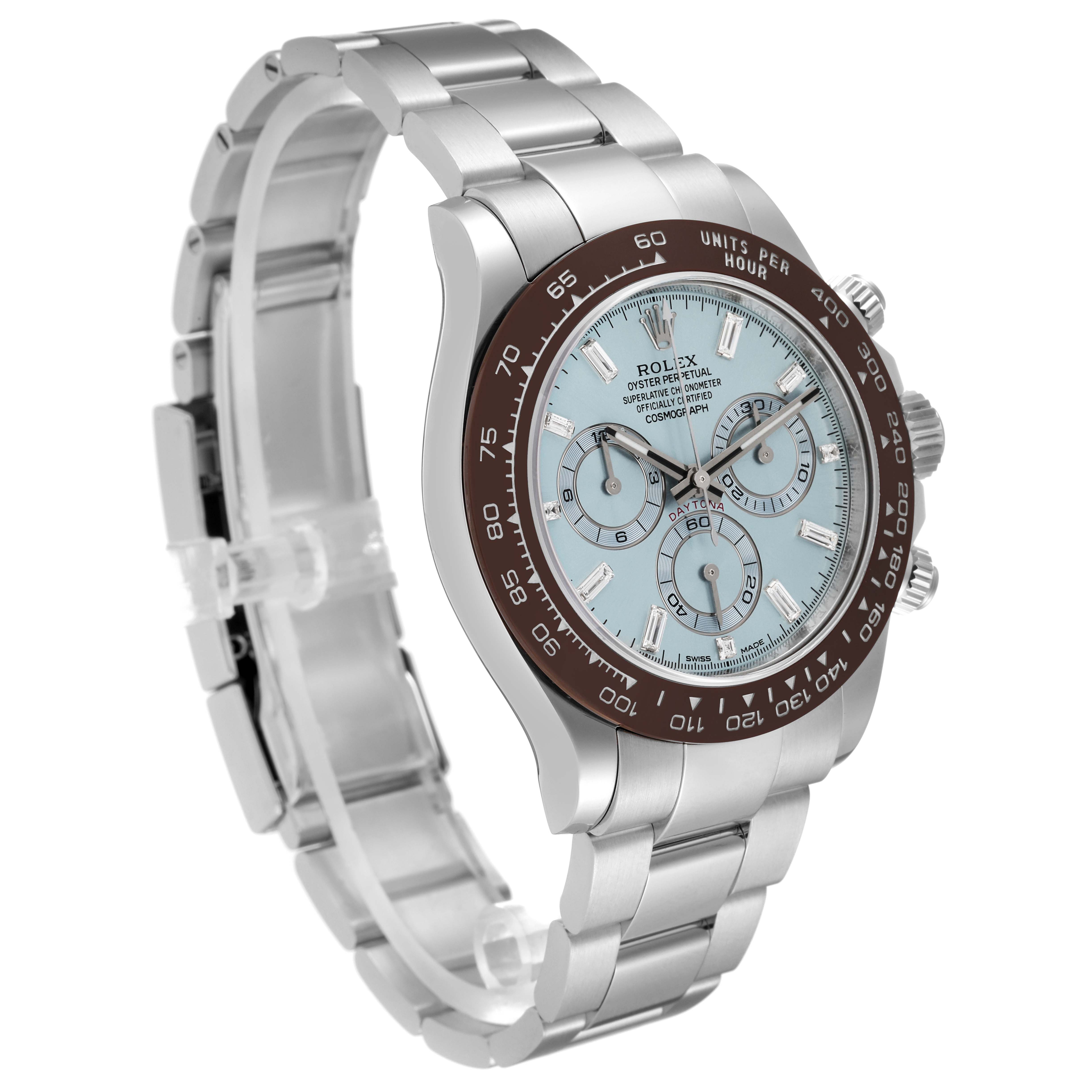 This image shows a Rolex Daytona 116506 Men's Platinum Blue Dial 116506 Men's Platinum Blue Dial watch at a three-quarter angle, featuring its stainless steel bracelet, brown bezel, and light blue dial with subdials.