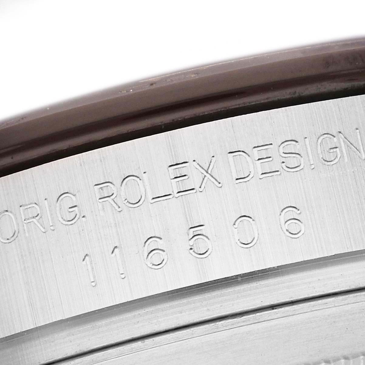 The image shows a close-up angle of the engraved model number 116506 on the bezel of a Rolex Daytona 116506 Men's Platinum Blue Dial 116506 Men's Platinum Blue Dial watch.