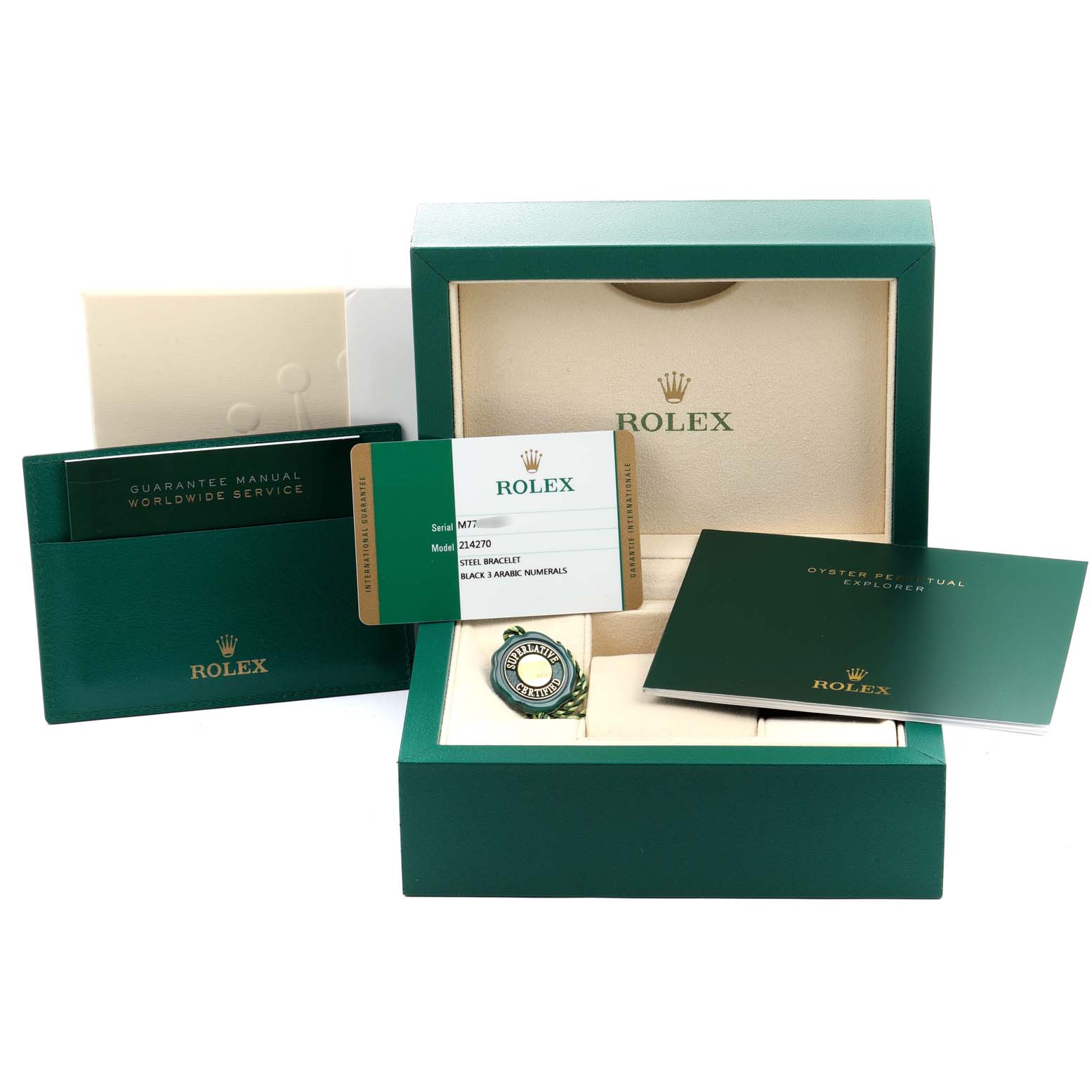 This image shows the Rolex Explorer 214270 Men
s Stainless Steel Black Dial 214270 Men
s Stainless Steel Black Dial packaging, including manuals, a warranty card, and a green box.