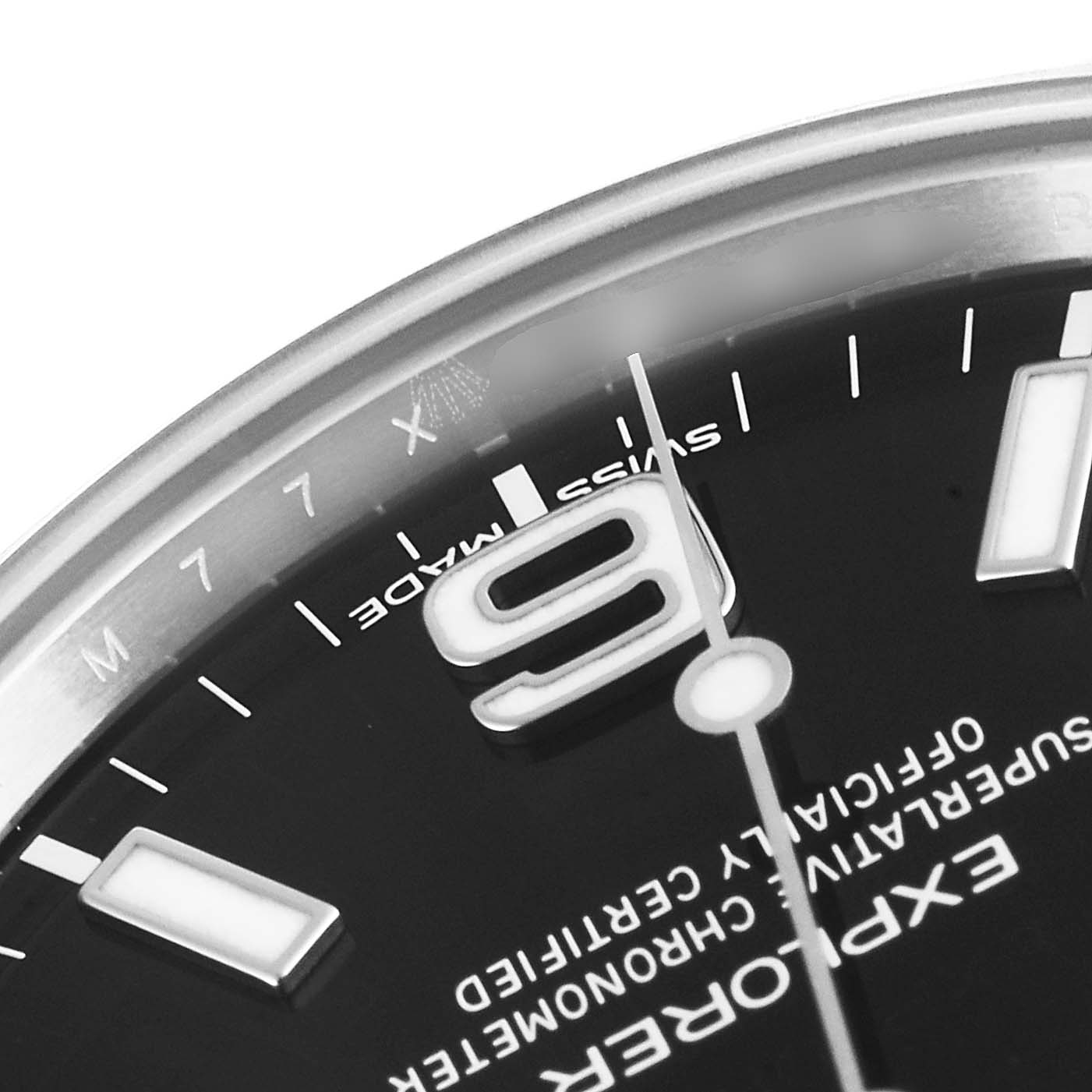 This is a close-up of the dial, bezel, and hour markers of a Rolex Explorer 214270 Men
s Stainless Steel Black Dial 214270 Men
s Stainless Steel Black Dial watch.